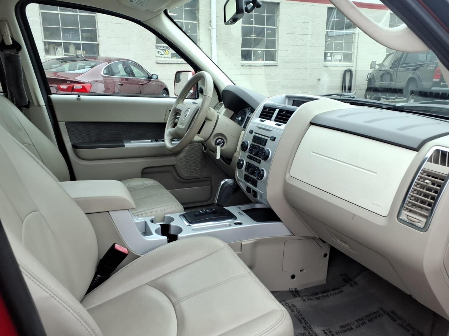 2010 Red Mercury Mariner Premier I4 (4M2CN8H73AK) with an 2.5L Duratec 2.5L I4 171hp 171ft. lbs. Sequential-Port F.I. engine, 6-Speed Automatic transmission, located at 50 Eastern Blvd., Essex, MD, 21221, (410) 686-3444, 39.304367, -76.484947 - Photo#13