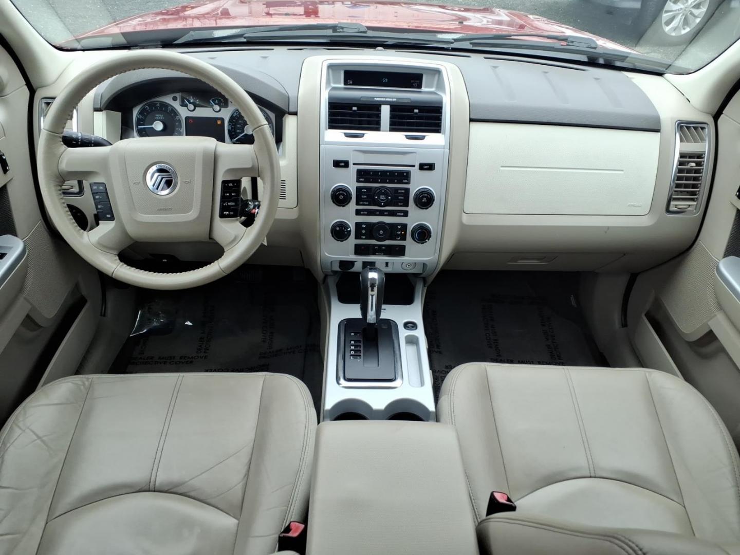 2010 Red Mercury Mariner Premier I4 (4M2CN8H73AK) with an 2.5L Duratec 2.5L I4 171hp 171ft. lbs. Sequential-Port F.I. engine, 6-Speed Automatic transmission, located at 50 Eastern Blvd., Essex, MD, 21221, (410) 686-3444, 39.304367, -76.484947 - Photo#16