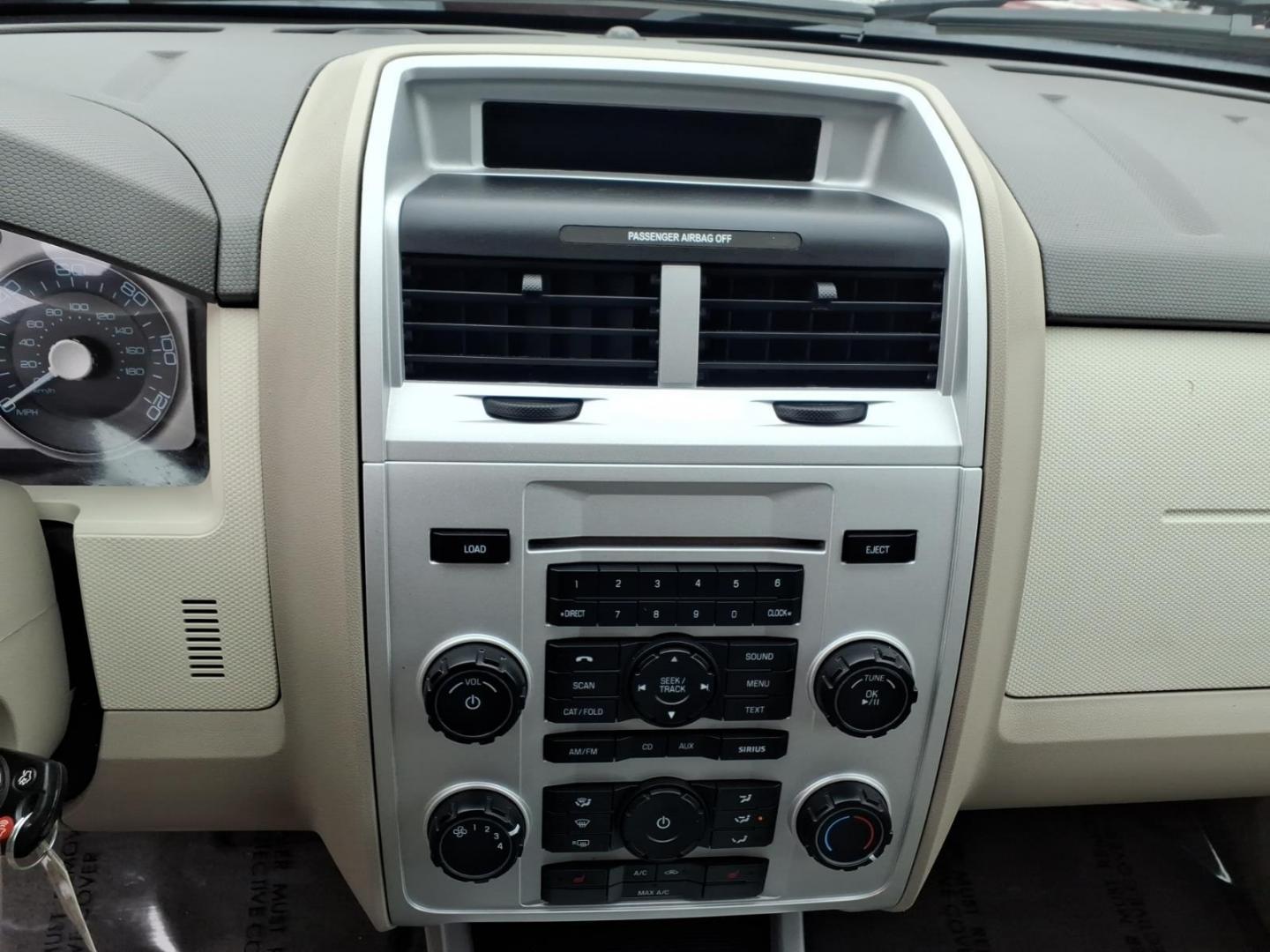 2010 Red Mercury Mariner Premier I4 (4M2CN8H73AK) with an 2.5L Duratec 2.5L I4 171hp 171ft. lbs. Sequential-Port F.I. engine, 6-Speed Automatic transmission, located at 50 Eastern Blvd., Essex, MD, 21221, (410) 686-3444, 39.304367, -76.484947 - Photo#18