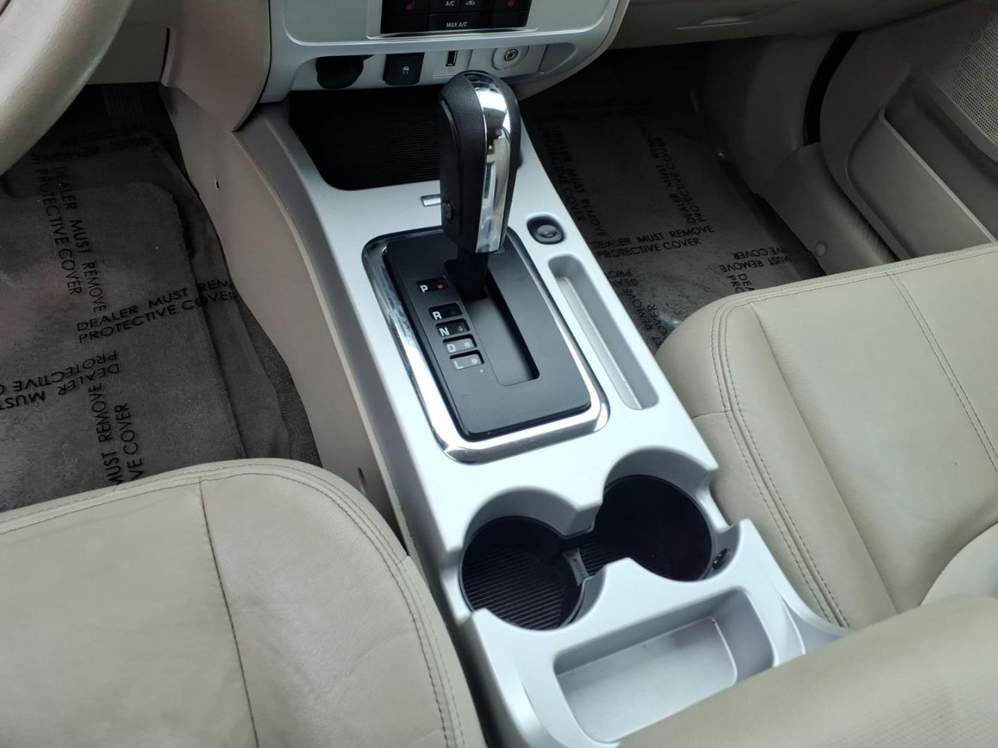 2010 Red Mercury Mariner Premier I4 (4M2CN8H73AK) with an 2.5L Duratec 2.5L I4 171hp 171ft. lbs. Sequential-Port F.I. engine, 6-Speed Automatic transmission, located at 50 Eastern Blvd., Essex, MD, 21221, (410) 686-3444, 39.304367, -76.484947 - Photo#19