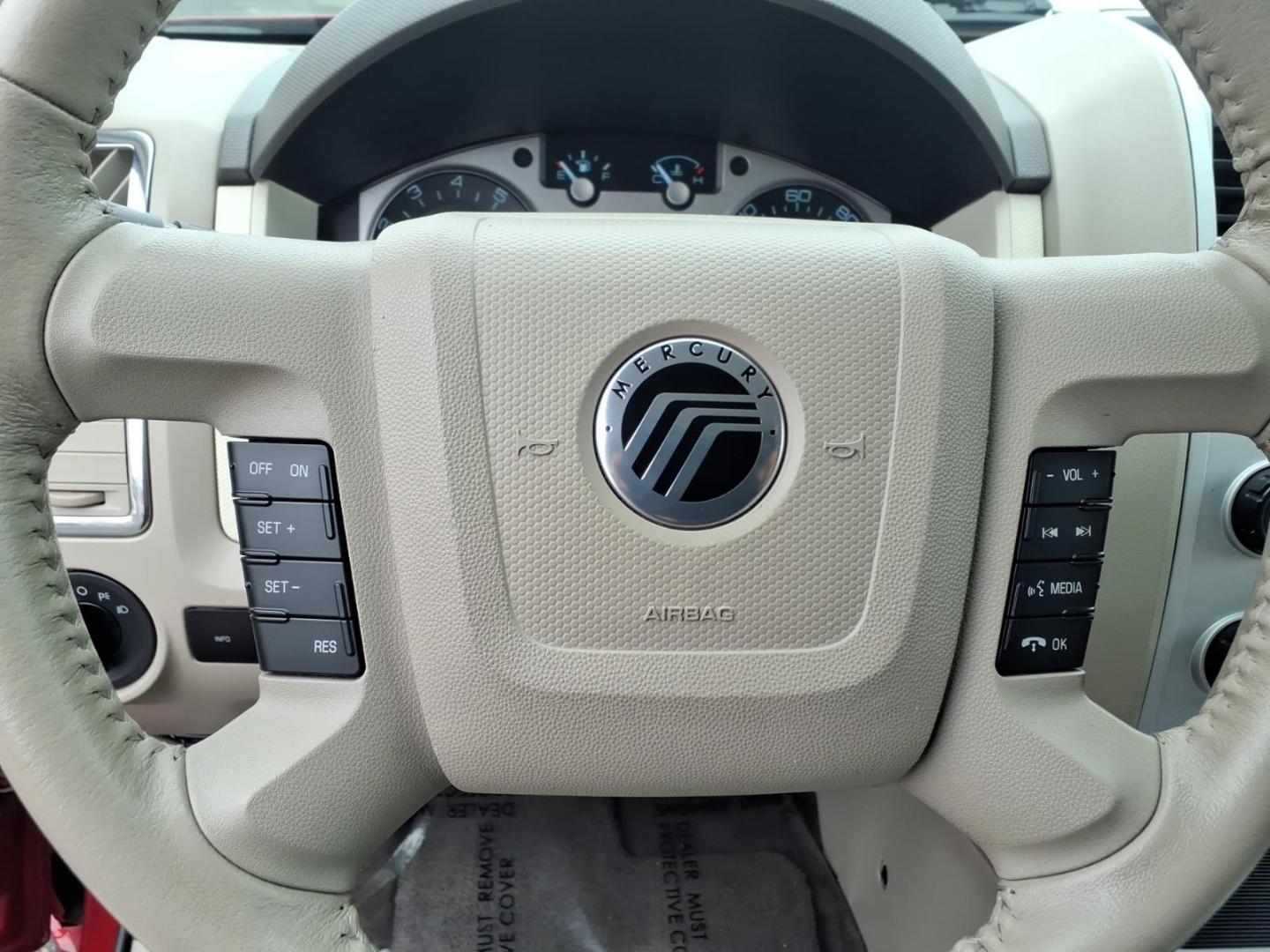 2010 Red Mercury Mariner Premier I4 (4M2CN8H73AK) with an 2.5L Duratec 2.5L I4 171hp 171ft. lbs. Sequential-Port F.I. engine, 6-Speed Automatic transmission, located at 50 Eastern Blvd., Essex, MD, 21221, (410) 686-3444, 39.304367, -76.484947 - Photo#21