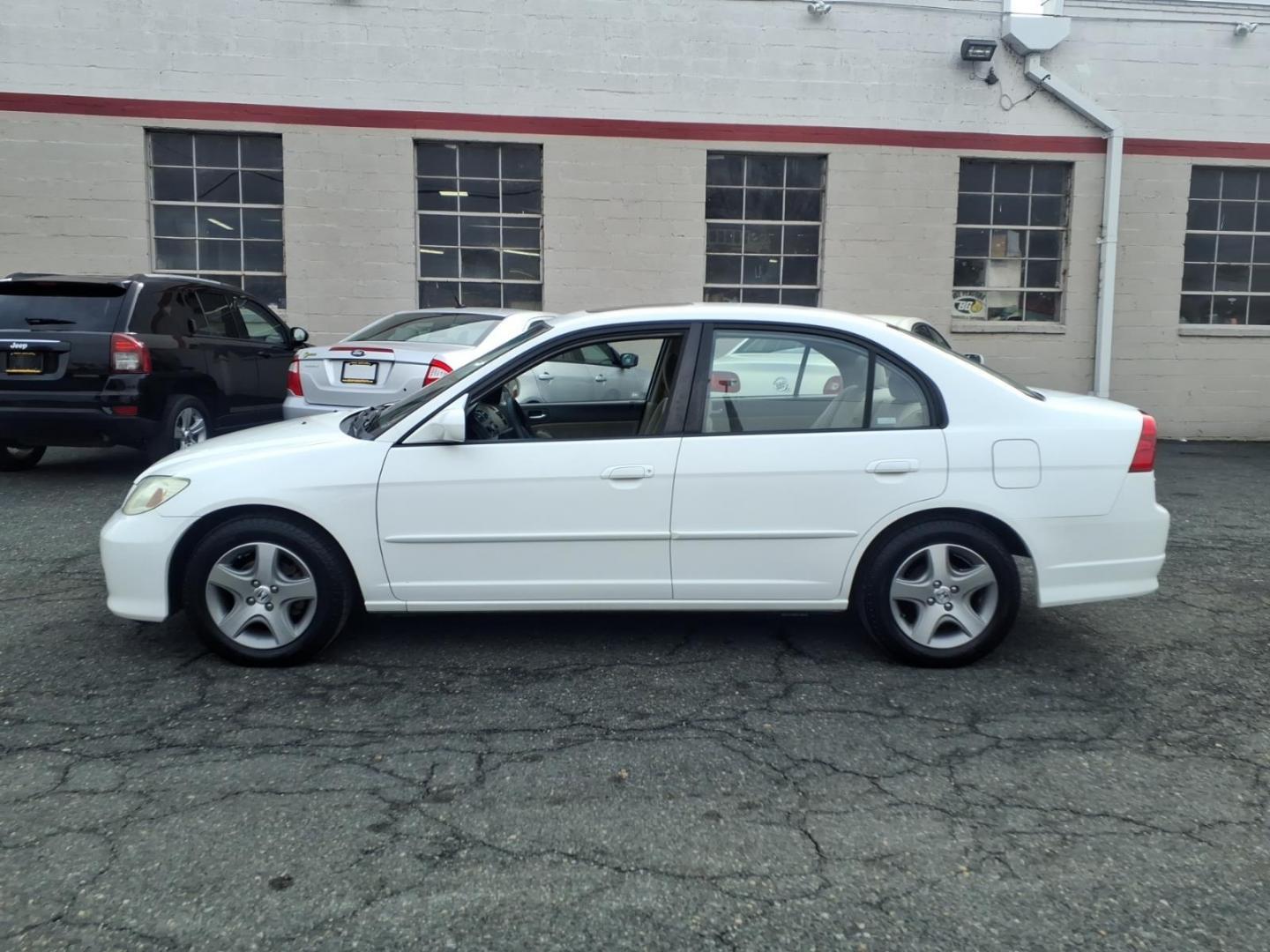 2004 White Honda Civic (2HGES257X4H) with an 1.7L 4 Cylinder Fuel Injected engine, Automatic transmission, located at 50 Eastern Blvd., Essex, MD, 21221, (410) 686-3444, 39.304367, -76.484947 - Photo#1