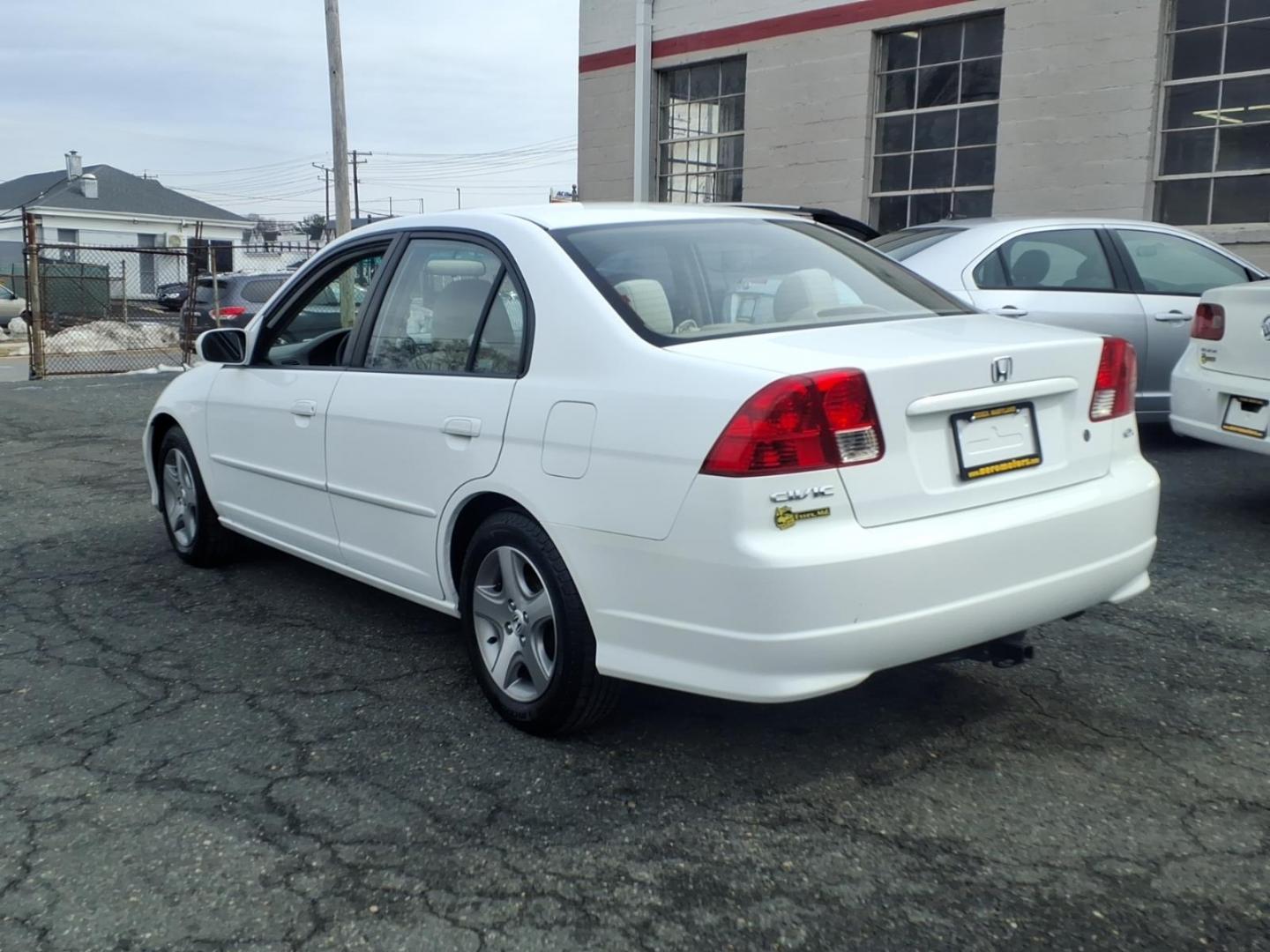 2004 White Honda Civic (2HGES257X4H) with an 1.7L 4 Cylinder Fuel Injected engine, Automatic transmission, located at 50 Eastern Blvd., Essex, MD, 21221, (410) 686-3444, 39.304367, -76.484947 - Photo#2