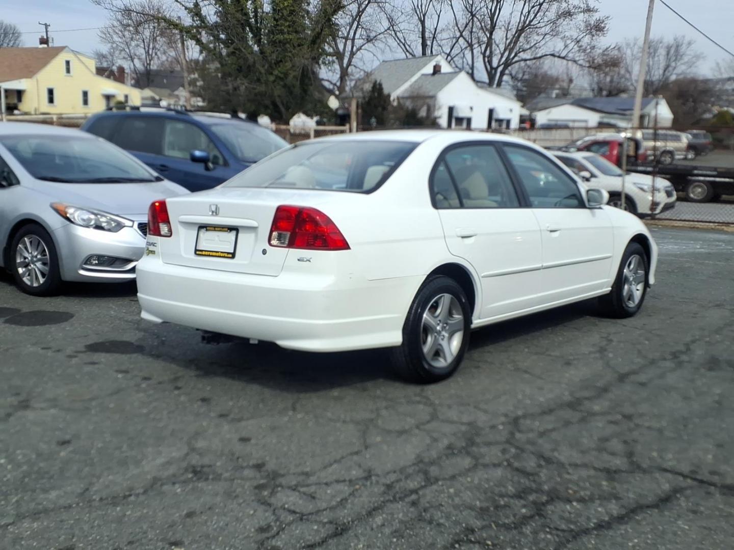 2004 White Honda Civic (2HGES257X4H) with an 1.7L 4 Cylinder Fuel Injected engine, Automatic transmission, located at 50 Eastern Blvd., Essex, MD, 21221, (410) 686-3444, 39.304367, -76.484947 - Photo#4