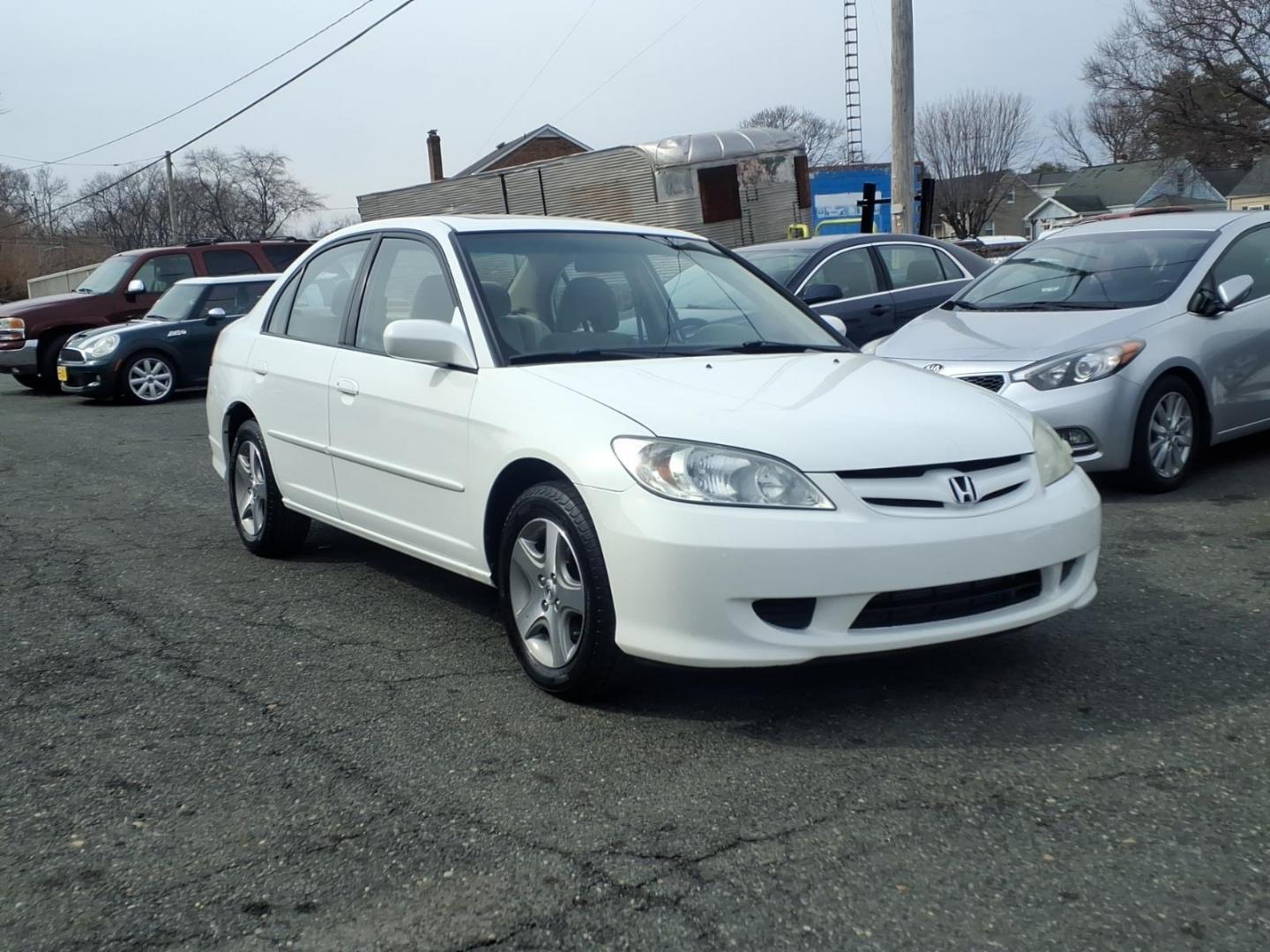2004 White Honda Civic (2HGES257X4H) with an 1.7L 4 Cylinder Fuel Injected engine, Automatic transmission, located at 50 Eastern Blvd., Essex, MD, 21221, (410) 686-3444, 39.304367, -76.484947 - Photo#6
