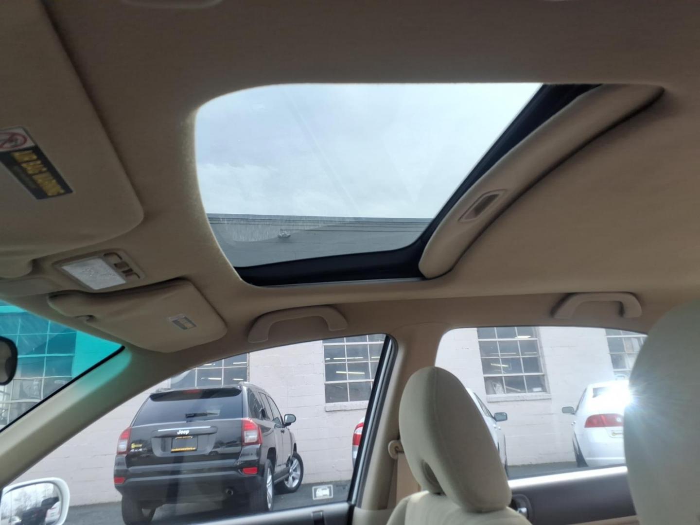 2004 White Honda Civic (2HGES257X4H) with an 1.7L 4 Cylinder Fuel Injected engine, Automatic transmission, located at 50 Eastern Blvd., Essex, MD, 21221, (410) 686-3444, 39.304367, -76.484947 - Photo#9