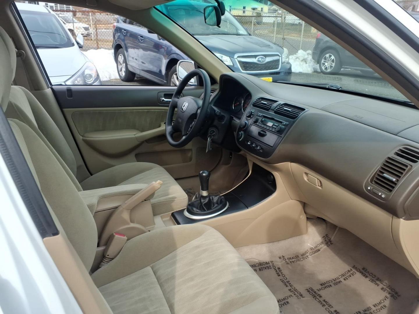 2004 White Honda Civic (2HGES257X4H) with an 1.7L 4 Cylinder Fuel Injected engine, Automatic transmission, located at 50 Eastern Blvd., Essex, MD, 21221, (410) 686-3444, 39.304367, -76.484947 - Photo#15