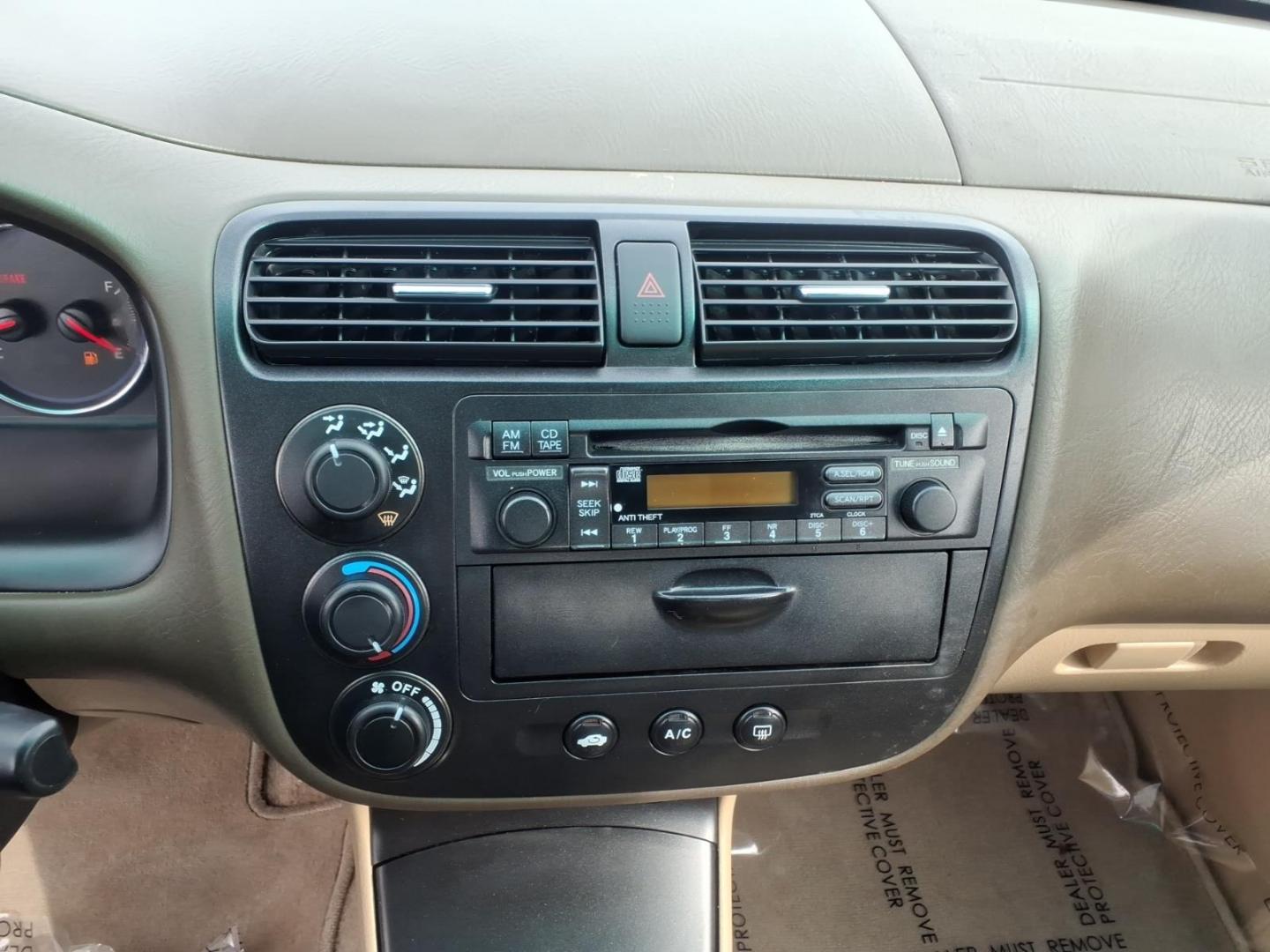 2004 White Honda Civic (2HGES257X4H) with an 1.7L 4 Cylinder Fuel Injected engine, Automatic transmission, located at 50 Eastern Blvd., Essex, MD, 21221, (410) 686-3444, 39.304367, -76.484947 - Photo#17