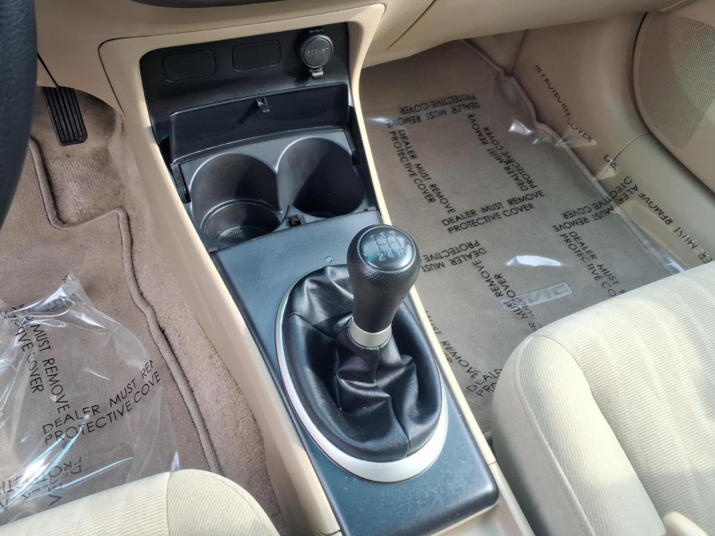 2004 White Honda Civic (2HGES257X4H) with an 1.7L 4 Cylinder Fuel Injected engine, Automatic transmission, located at 50 Eastern Blvd., Essex, MD, 21221, (410) 686-3444, 39.304367, -76.484947 - Photo#18