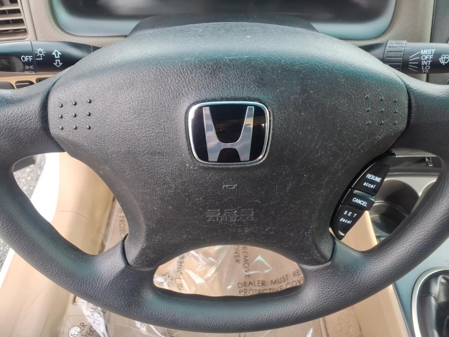 2004 White Honda Civic (2HGES257X4H) with an 1.7L 4 Cylinder Fuel Injected engine, Automatic transmission, located at 50 Eastern Blvd., Essex, MD, 21221, (410) 686-3444, 39.304367, -76.484947 - Photo#20
