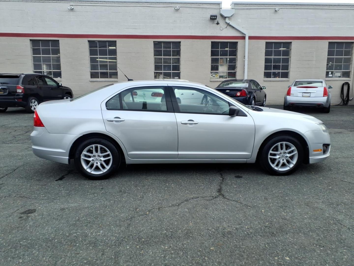 2012 Silver Ford Fusion S (3FAHP0GA3CR) with an 2.5L 2.5L I4 175hp 172ft. lbs. Sequential-Port F.I. engine, 6-Speed Automatic transmission, located at 50 Eastern Blvd., Essex, MD, 21221, (410) 686-3444, 39.304367, -76.484947 - Photo#5