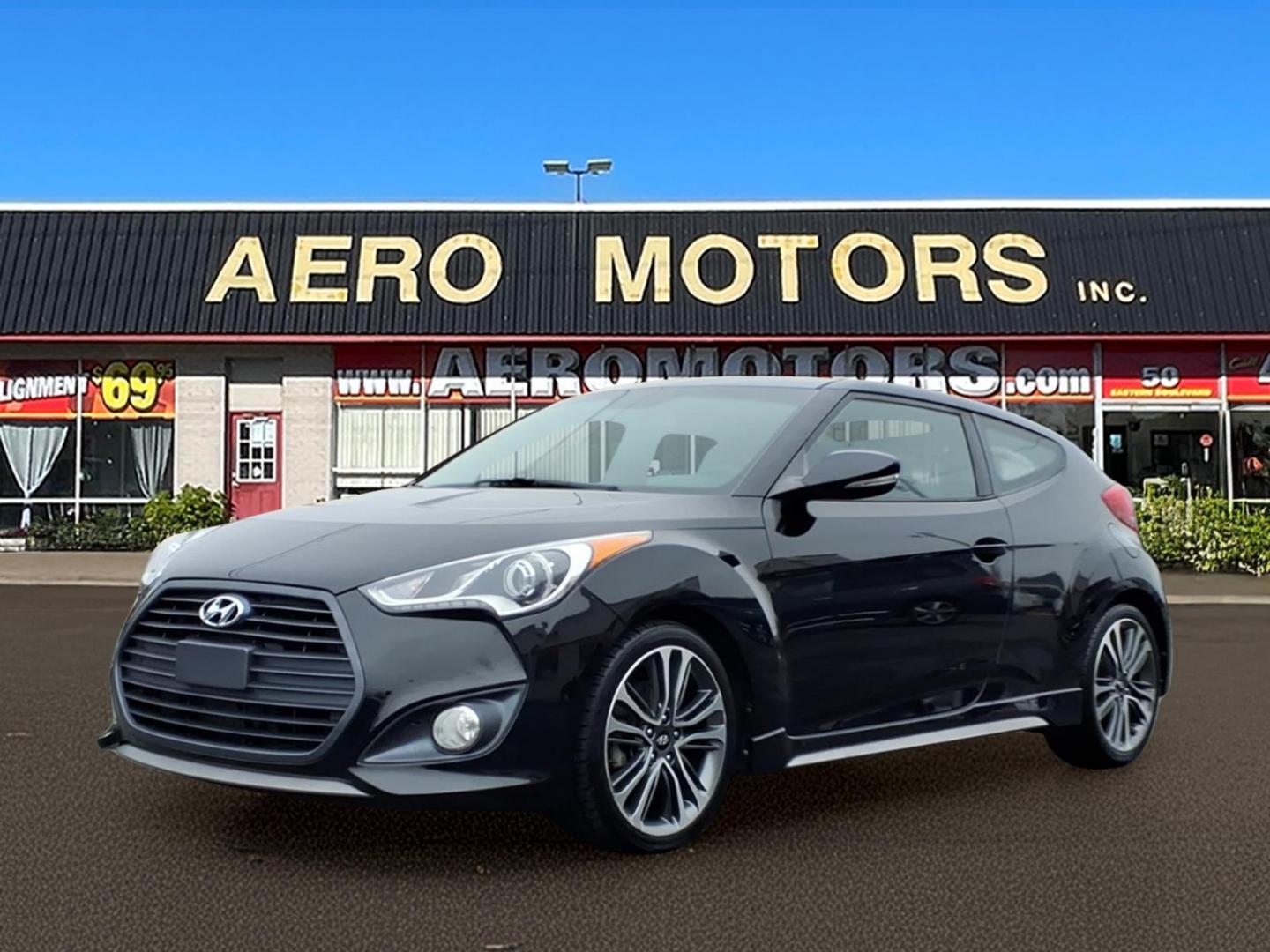 2016 Black Hyundai VELOSTER Turbo (KMHTC6AE4GU) with an 1.6L 1.6L Turbo I4 201hp 195ft. lbs. Turbocharged engine, Automatic transmission, located at 50 Eastern Blvd., Essex, MD, 21221, (410) 686-3444, 39.304367, -76.484947 - Photo#0