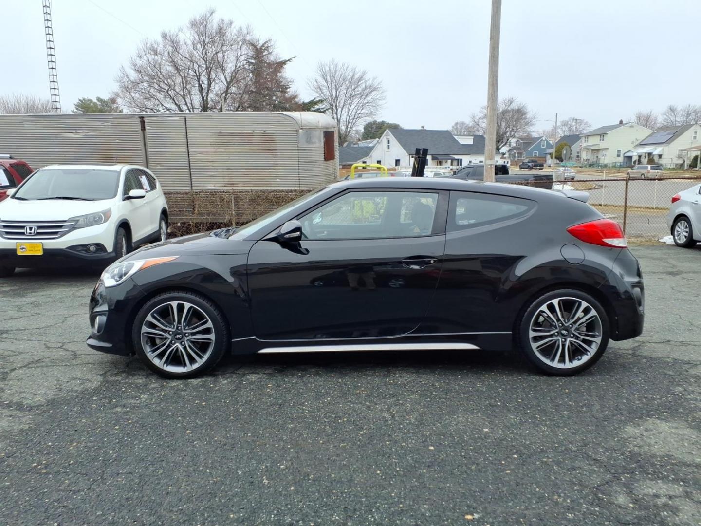 2016 Black Hyundai VELOSTER Turbo (KMHTC6AE4GU) with an 1.6L 1.6L Turbo I4 201hp 195ft. lbs. Turbocharged engine, Automatic transmission, located at 50 Eastern Blvd., Essex, MD, 21221, (410) 686-3444, 39.304367, -76.484947 - Photo#1