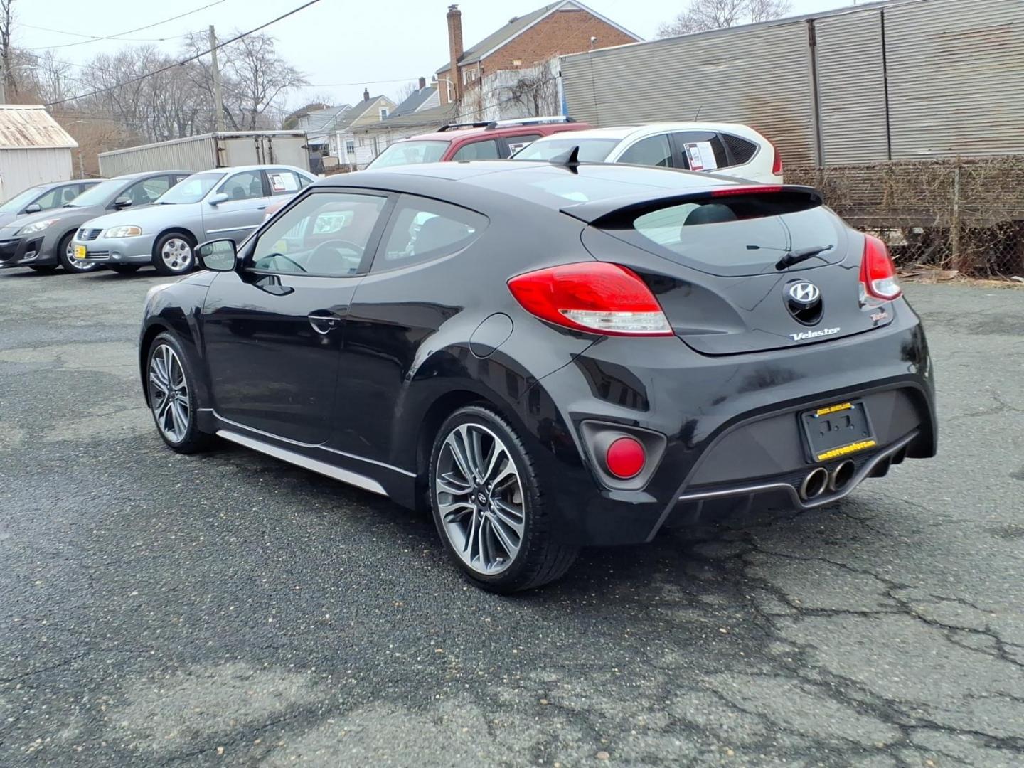 2016 Black Hyundai VELOSTER Turbo (KMHTC6AE4GU) with an 1.6L 1.6L Turbo I4 201hp 195ft. lbs. Turbocharged engine, Automatic transmission, located at 50 Eastern Blvd., Essex, MD, 21221, (410) 686-3444, 39.304367, -76.484947 - Photo#2