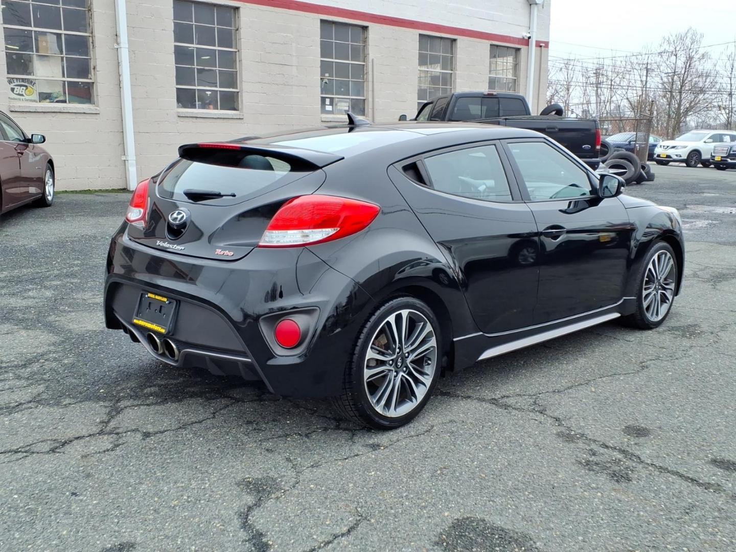 2016 Black Hyundai VELOSTER Turbo (KMHTC6AE4GU) with an 1.6L 1.6L Turbo I4 201hp 195ft. lbs. Turbocharged engine, Automatic transmission, located at 50 Eastern Blvd., Essex, MD, 21221, (410) 686-3444, 39.304367, -76.484947 - Photo#4