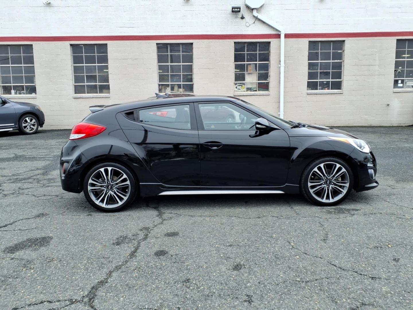 2016 Black Hyundai VELOSTER Turbo (KMHTC6AE4GU) with an 1.6L 1.6L Turbo I4 201hp 195ft. lbs. Turbocharged engine, Automatic transmission, located at 50 Eastern Blvd., Essex, MD, 21221, (410) 686-3444, 39.304367, -76.484947 - Photo#5
