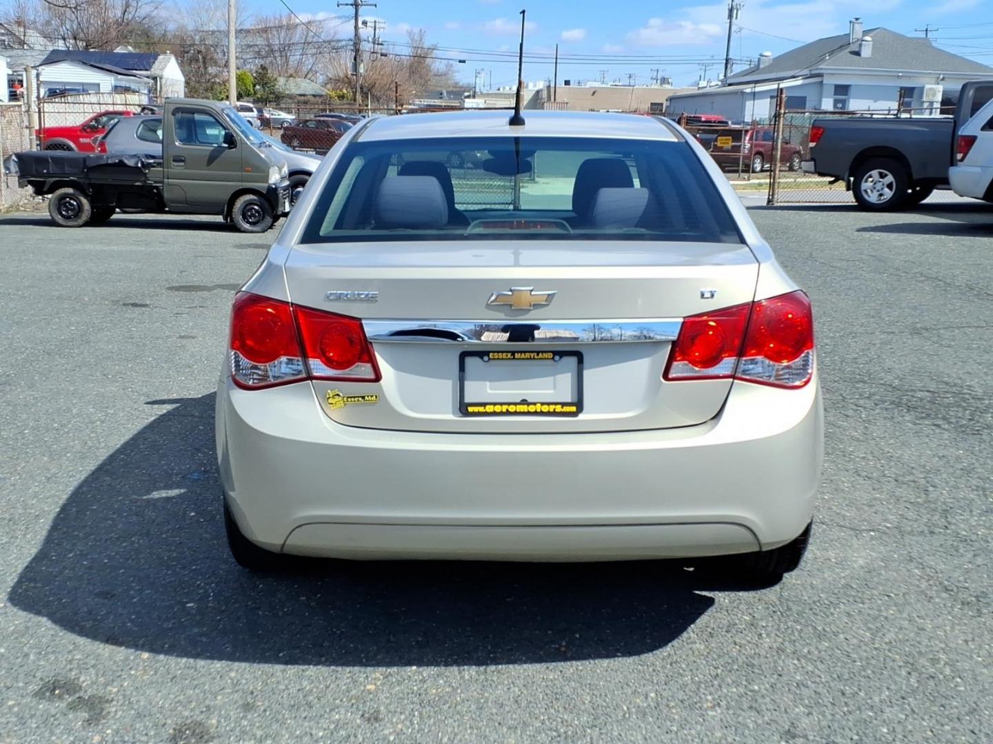 2012 Gold Chevrolet Cruze LT (1G1PF5SC6C7) with an 1.4L Ecotec 1.4L Turbo I4 138hp 148ft. lbs. Sequential-Port F.I. engine, 6-Speed Shiftable Automatic transmission, located at 50 Eastern Blvd., Essex, MD, 21221, (410) 686-3444, 39.304367, -76.484947 - Photo#3