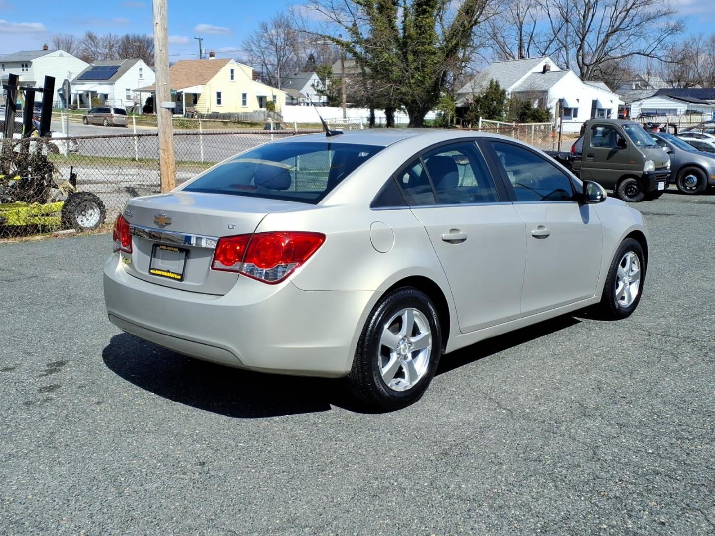 2012 Gold Chevrolet Cruze LT (1G1PF5SC6C7) with an 1.4L Ecotec 1.4L Turbo I4 138hp 148ft. lbs. Sequential-Port F.I. engine, 6-Speed Shiftable Automatic transmission, located at 50 Eastern Blvd., Essex, MD, 21221, (410) 686-3444, 39.304367, -76.484947 - Photo#4