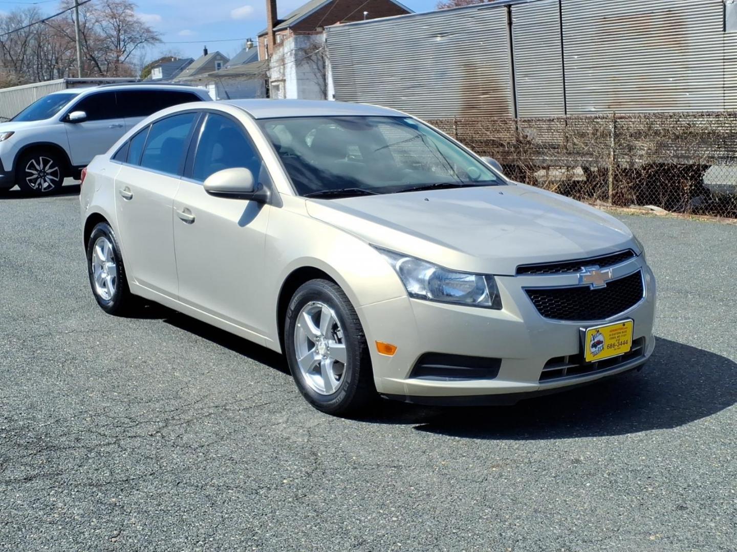 2012 Gold Chevrolet Cruze LT (1G1PF5SC6C7) with an 1.4L Ecotec 1.4L Turbo I4 138hp 148ft. lbs. Sequential-Port F.I. engine, 6-Speed Shiftable Automatic transmission, located at 50 Eastern Blvd., Essex, MD, 21221, (410) 686-3444, 39.304367, -76.484947 - Photo#6