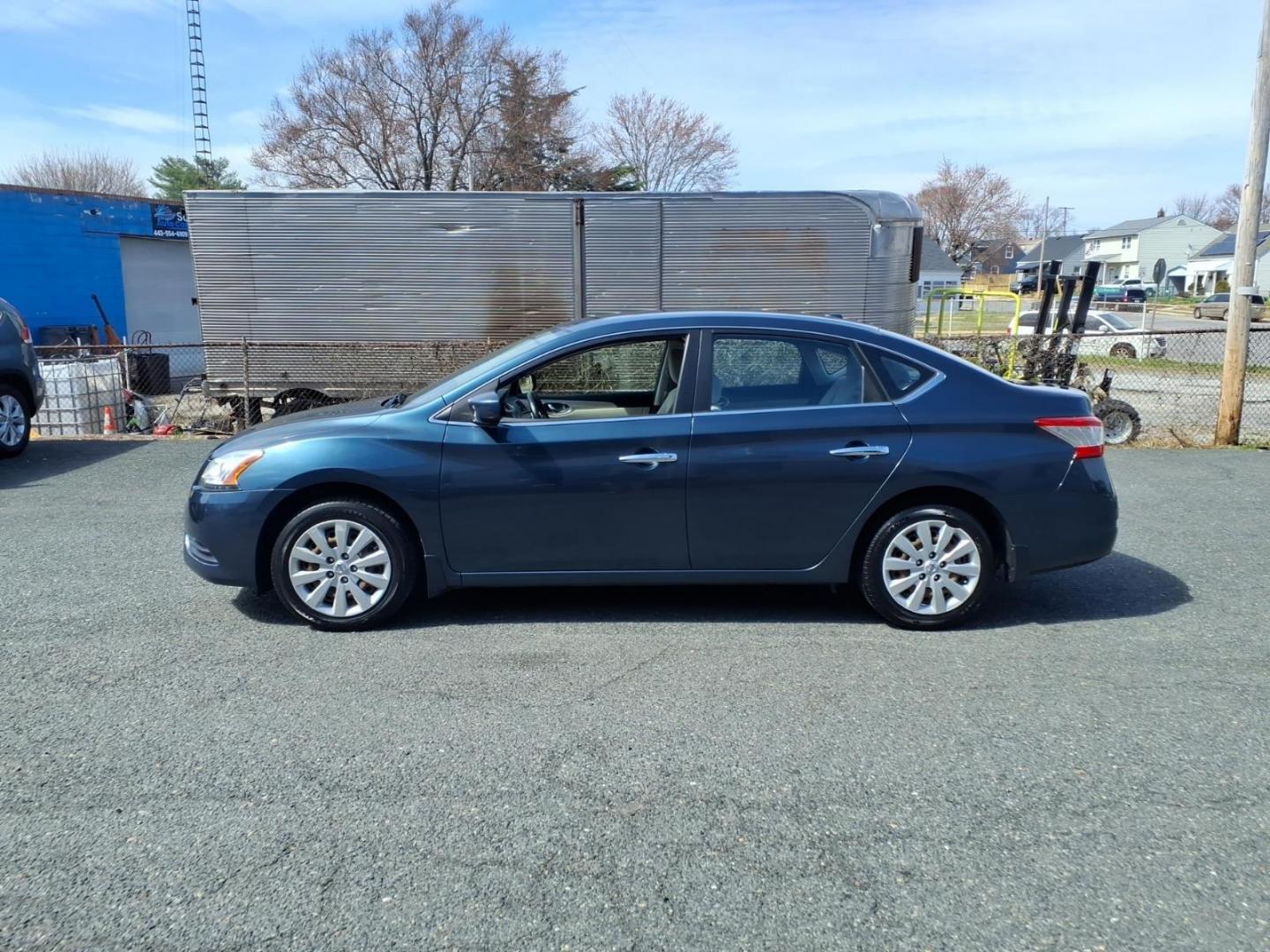 2015 Grey Nissan Sentra SV (3N1AB7AP6FY) with an 1.8L 1.8L I4 130hp 128ft. lbs. Sequential-Port F.I. engine, CVT transmission, located at 50 Eastern Blvd., Essex, MD, 21221, (410) 686-3444, 39.304367, -76.484947 - Photo#1