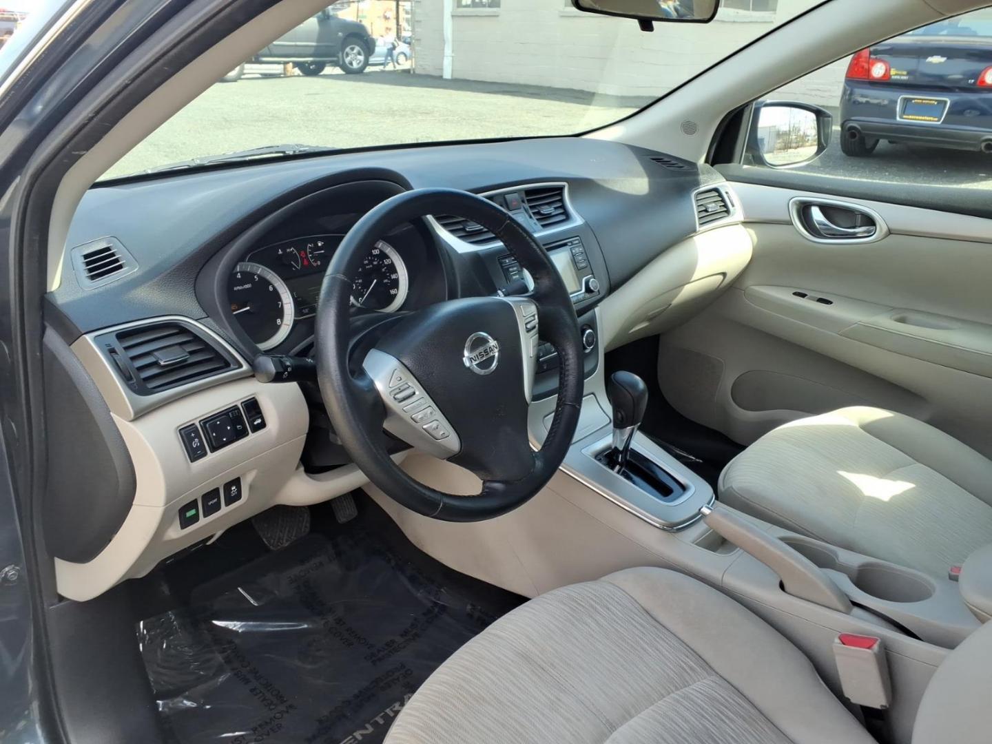2015 Grey Nissan Sentra SV (3N1AB7AP6FY) with an 1.8L 1.8L I4 130hp 128ft. lbs. Sequential-Port F.I. engine, CVT transmission, located at 50 Eastern Blvd., Essex, MD, 21221, (410) 686-3444, 39.304367, -76.484947 - Photo#8