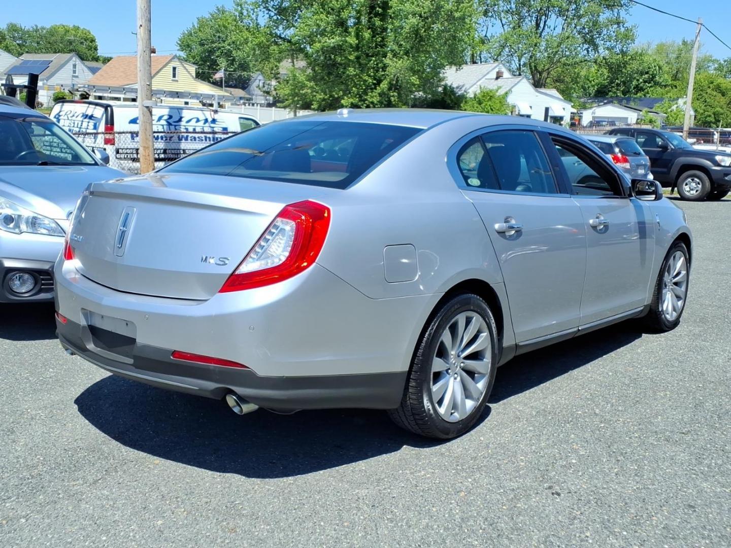 2013 Silver Lincoln MKS Base (1LNHL9DK1DG) with an 3.7L 6 Cylinder Sequential-Port F.I. engine, V6 transmission, located at 50 Eastern Blvd., Essex, MD, 21221, (410) 686-3444, 39.304367, -76.484947 - Photo#3