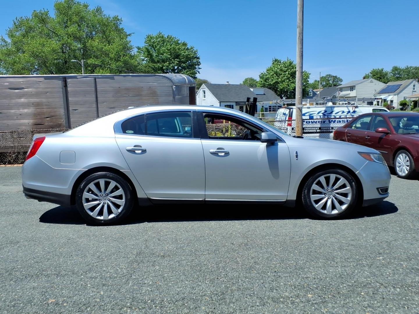 2013 Silver Lincoln MKS Base (1LNHL9DK1DG) with an 3.7L 6 Cylinder Sequential-Port F.I. engine, V6 transmission, located at 50 Eastern Blvd., Essex, MD, 21221, (410) 686-3444, 39.304367, -76.484947 - Photo#4