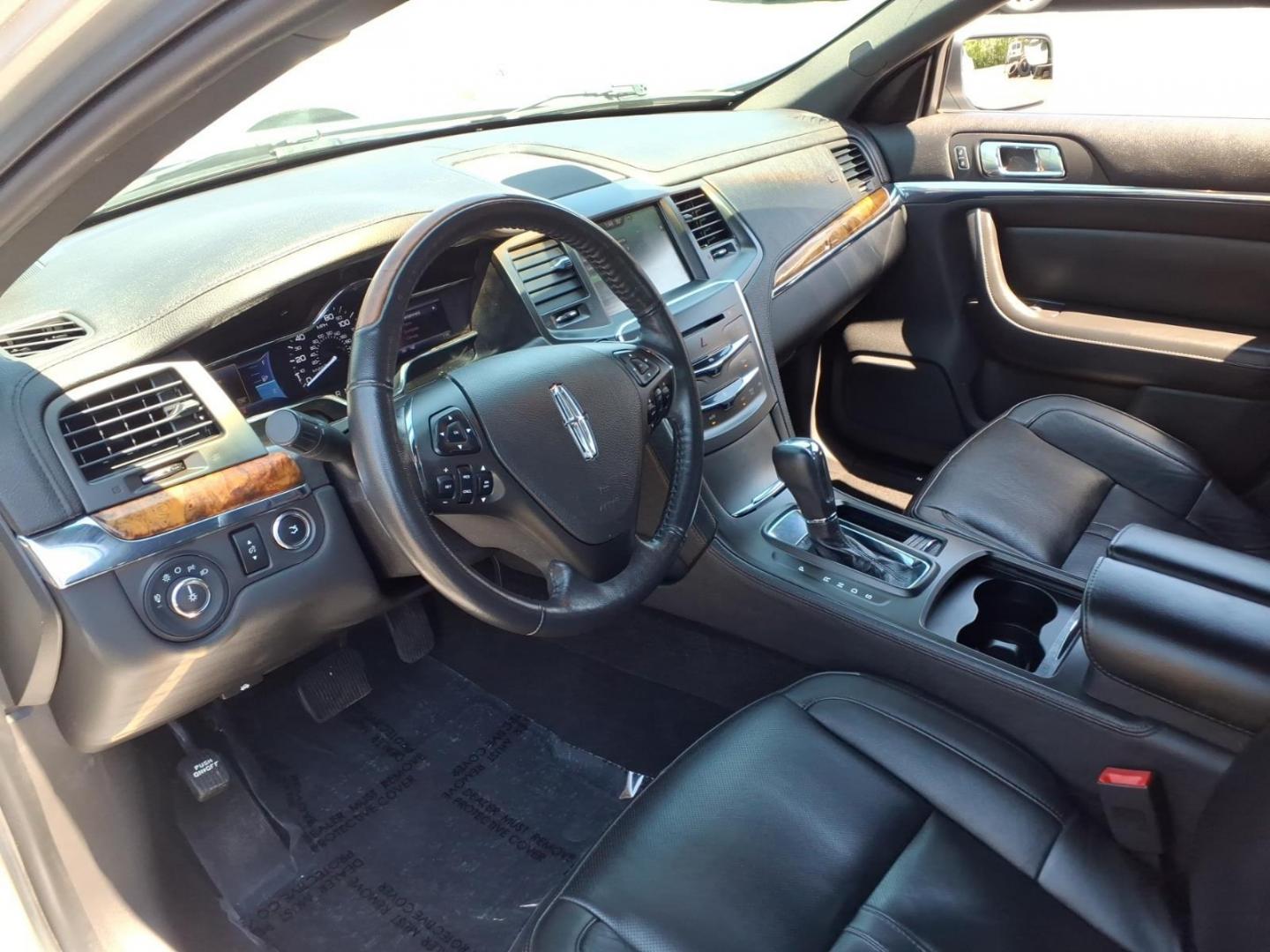 2013 Silver Lincoln MKS Base (1LNHL9DK1DG) with an 3.7L 6 Cylinder Sequential-Port F.I. engine, V6 transmission, located at 50 Eastern Blvd., Essex, MD, 21221, (410) 686-3444, 39.304367, -76.484947 - Photo#7