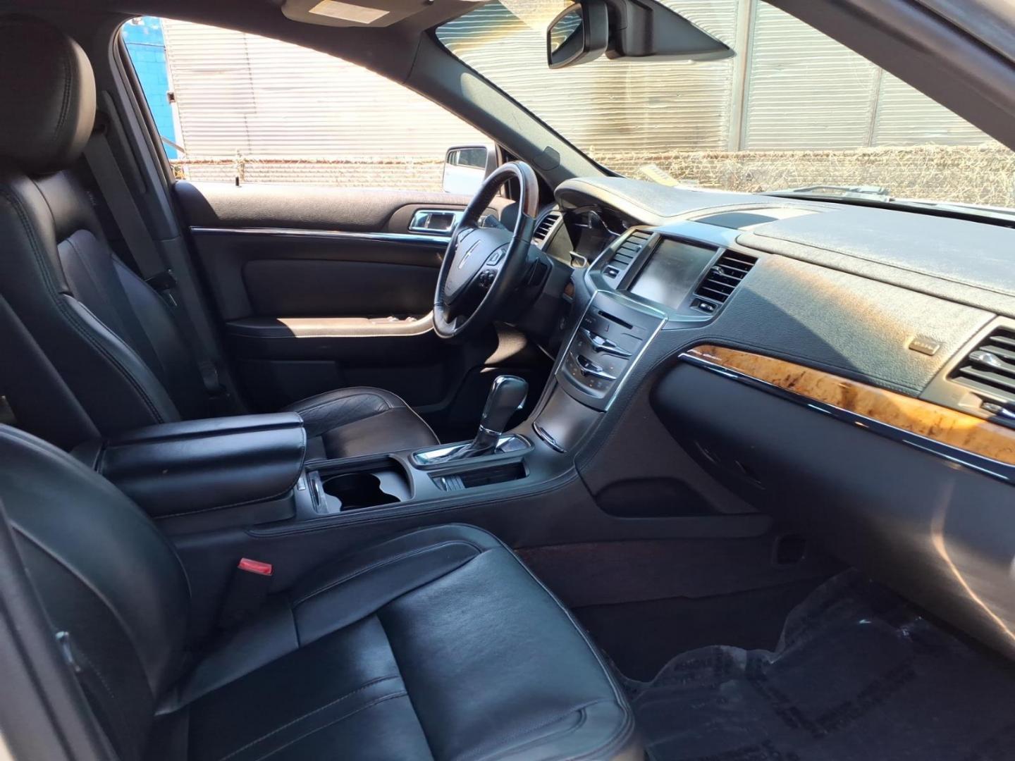 2013 Silver Lincoln MKS Base (1LNHL9DK1DG) with an 3.7L 6 Cylinder Sequential-Port F.I. engine, V6 transmission, located at 50 Eastern Blvd., Essex, MD, 21221, (410) 686-3444, 39.304367, -76.484947 - Photo#12