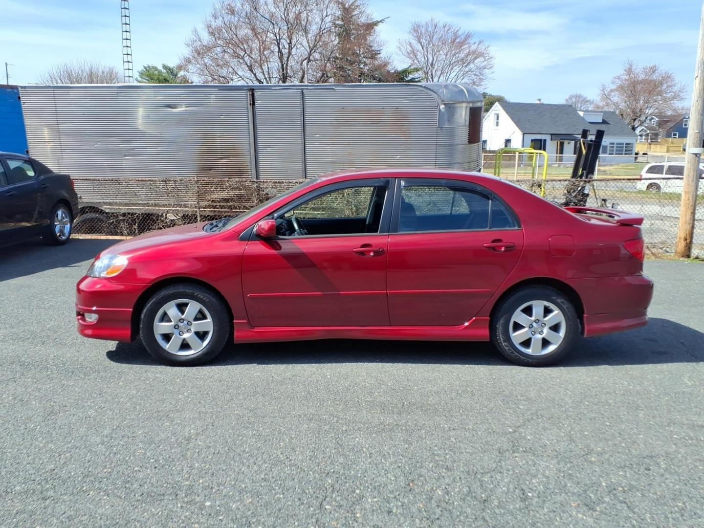 2006 Red Toyota Corolla CE (1NXBR32E16Z) with an 1.8L 1L NA I4 double overhead cam (DOHC) 16V Fuel Injected engine, 4-Speed Automatic transmission, located at 50 Eastern Blvd., Essex, MD, 21221, (410) 686-3444, 39.304367, -76.484947 - Photo#1