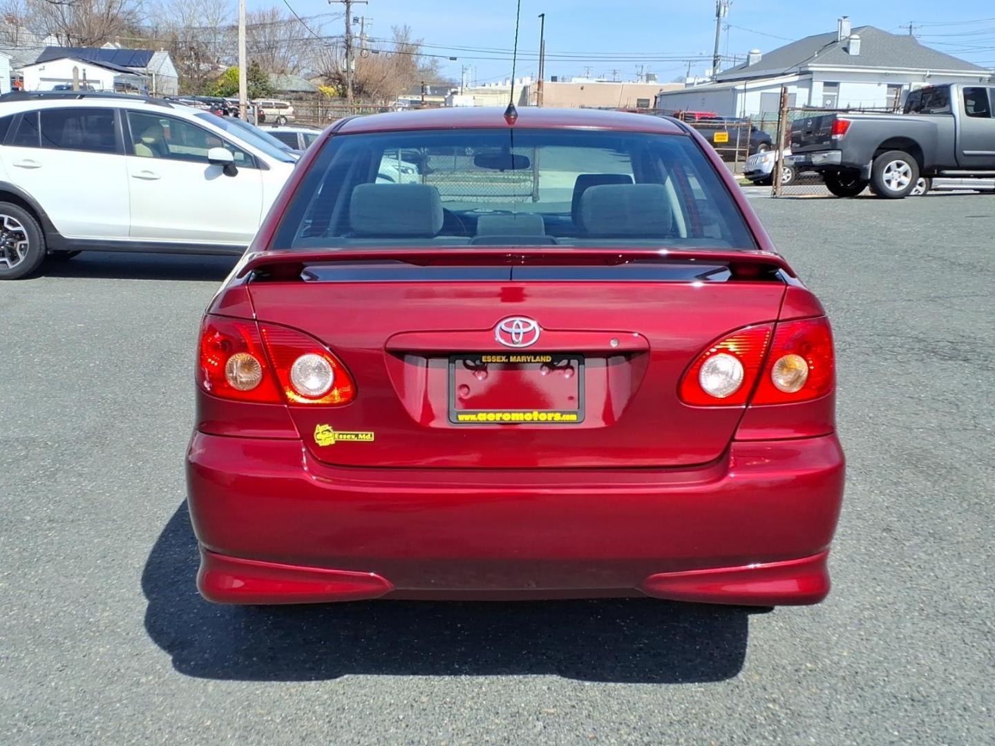 2006 Red Toyota Corolla CE (1NXBR32E16Z) with an 1.8L 1L NA I4 double overhead cam (DOHC) 16V Fuel Injected engine, 4-Speed Automatic transmission, located at 50 Eastern Blvd., Essex, MD, 21221, (410) 686-3444, 39.304367, -76.484947 - Photo#3