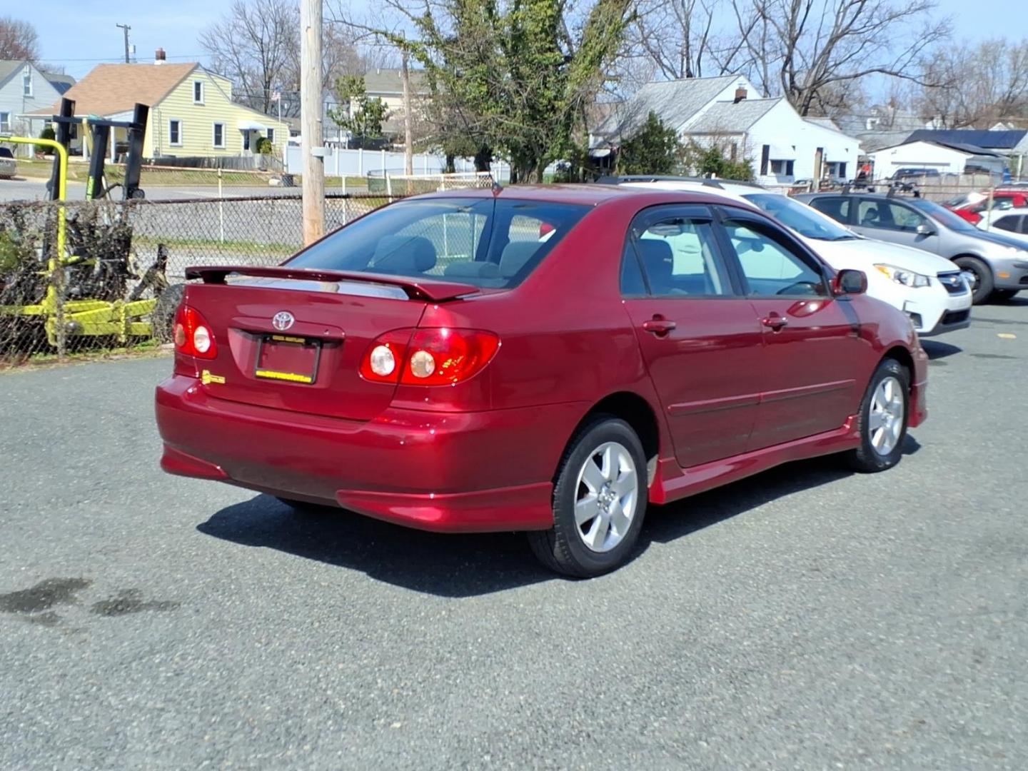 2006 Red Toyota Corolla CE (1NXBR32E16Z) with an 1.8L 1L NA I4 double overhead cam (DOHC) 16V Fuel Injected engine, 4-Speed Automatic transmission, located at 50 Eastern Blvd., Essex, MD, 21221, (410) 686-3444, 39.304367, -76.484947 - Photo#4