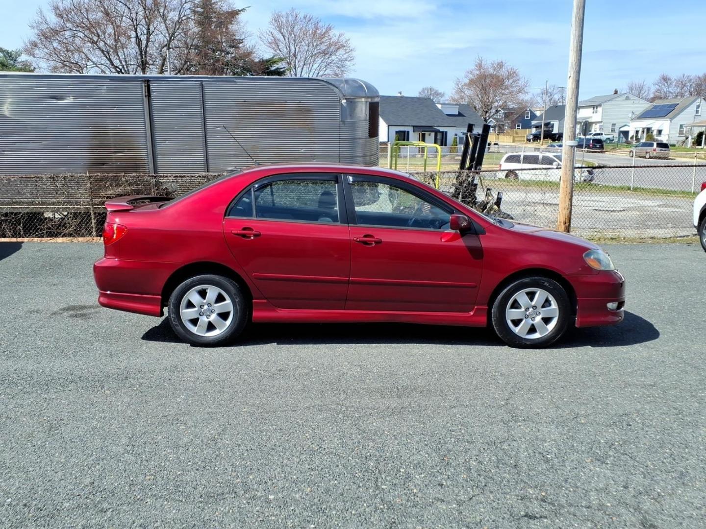 2006 Red Toyota Corolla CE (1NXBR32E16Z) with an 1.8L 1L NA I4 double overhead cam (DOHC) 16V Fuel Injected engine, 4-Speed Automatic transmission, located at 50 Eastern Blvd., Essex, MD, 21221, (410) 686-3444, 39.304367, -76.484947 - Photo#5
