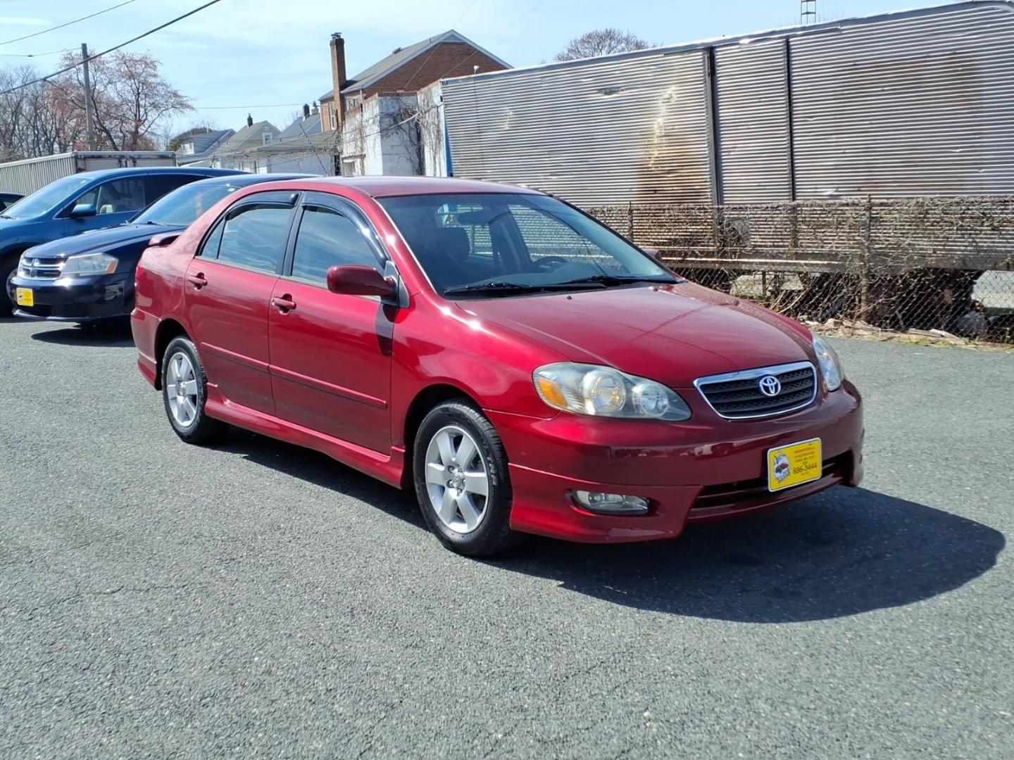 2006 Red Toyota Corolla CE (1NXBR32E16Z) with an 1.8L 1L NA I4 double overhead cam (DOHC) 16V Fuel Injected engine, 4-Speed Automatic transmission, located at 50 Eastern Blvd., Essex, MD, 21221, (410) 686-3444, 39.304367, -76.484947 - Photo#6