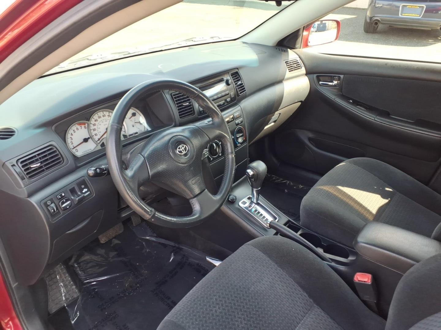 2006 Red Toyota Corolla CE (1NXBR32E16Z) with an 1.8L 1L NA I4 double overhead cam (DOHC) 16V Fuel Injected engine, 4-Speed Automatic transmission, located at 50 Eastern Blvd., Essex, MD, 21221, (410) 686-3444, 39.304367, -76.484947 - Photo#8
