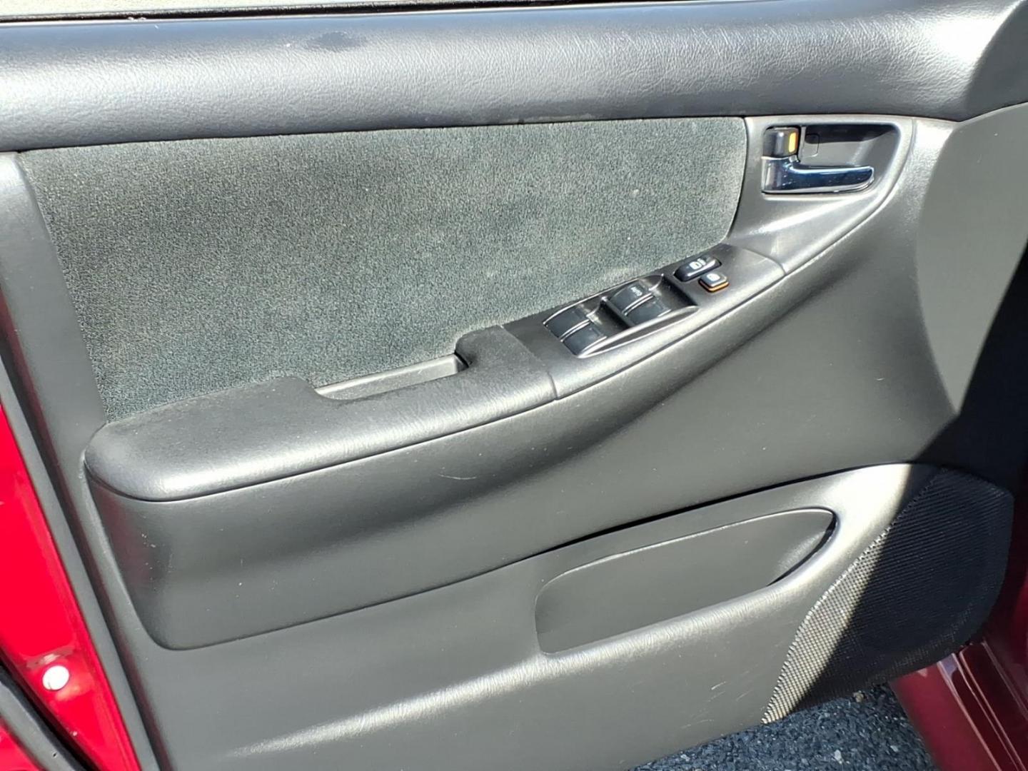 2006 Red Toyota Corolla CE (1NXBR32E16Z) with an 1.8L 1L NA I4 double overhead cam (DOHC) 16V Fuel Injected engine, 4-Speed Automatic transmission, located at 50 Eastern Blvd., Essex, MD, 21221, (410) 686-3444, 39.304367, -76.484947 - Photo#9