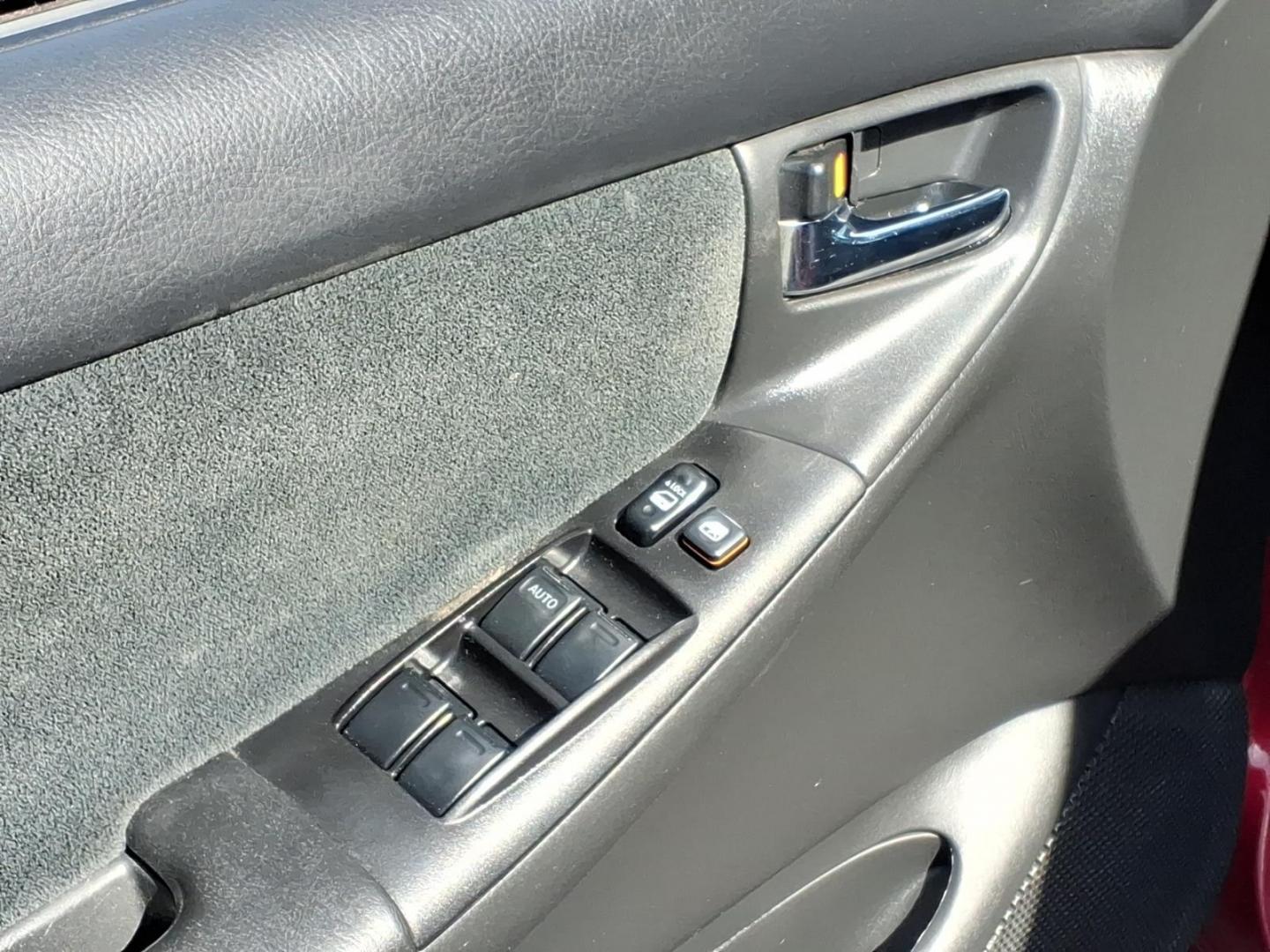 2006 Red Toyota Corolla CE (1NXBR32E16Z) with an 1.8L 1L NA I4 double overhead cam (DOHC) 16V Fuel Injected engine, 4-Speed Automatic transmission, located at 50 Eastern Blvd., Essex, MD, 21221, (410) 686-3444, 39.304367, -76.484947 - Photo#10