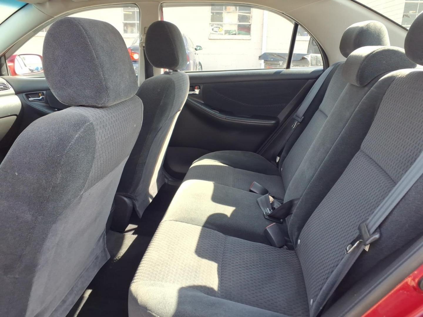 2006 Red Toyota Corolla CE (1NXBR32E16Z) with an 1.8L 1L NA I4 double overhead cam (DOHC) 16V Fuel Injected engine, 4-Speed Automatic transmission, located at 50 Eastern Blvd., Essex, MD, 21221, (410) 686-3444, 39.304367, -76.484947 - Photo#11