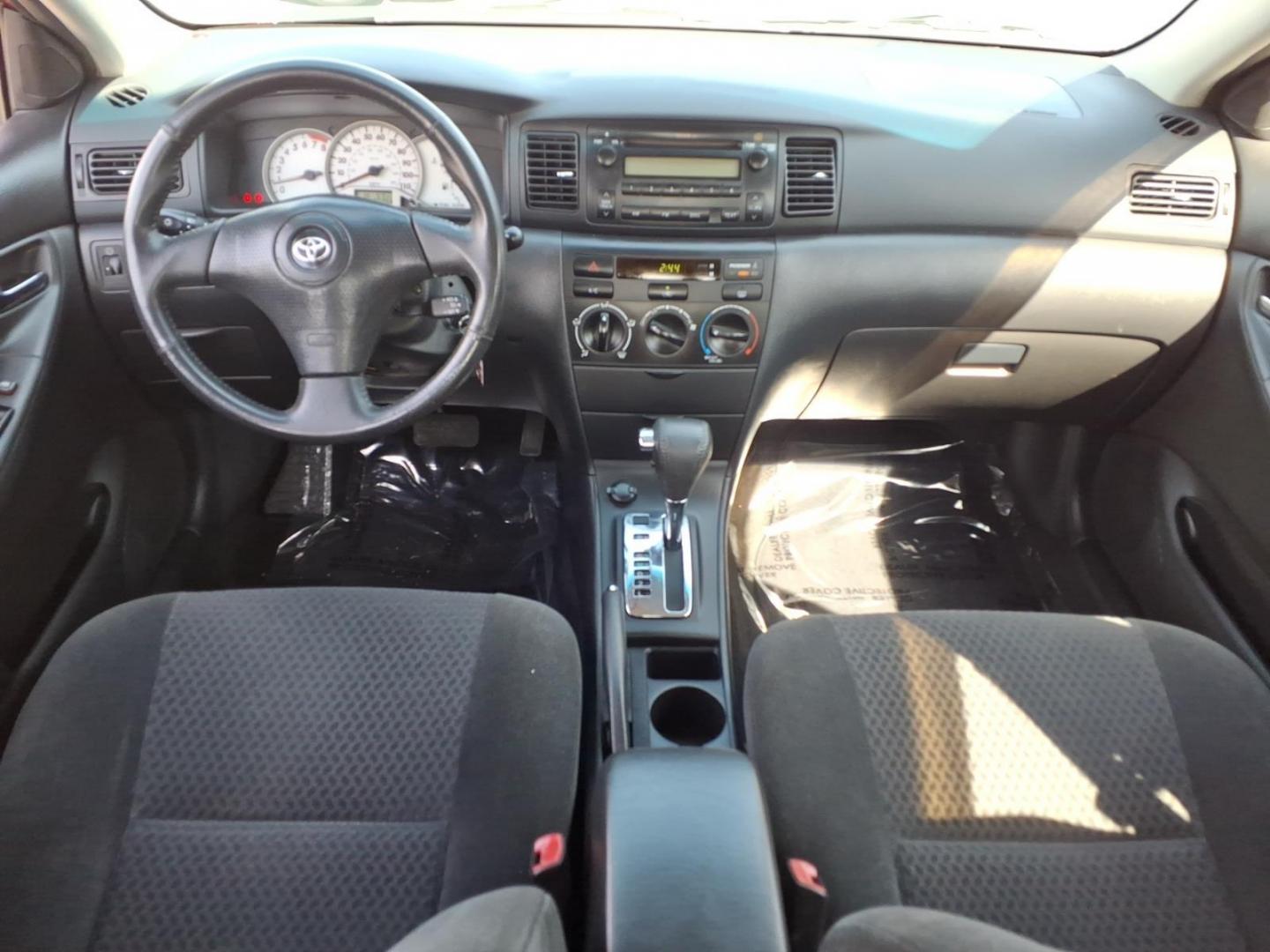 2006 Red Toyota Corolla CE (1NXBR32E16Z) with an 1.8L 1L NA I4 double overhead cam (DOHC) 16V Fuel Injected engine, 4-Speed Automatic transmission, located at 50 Eastern Blvd., Essex, MD, 21221, (410) 686-3444, 39.304367, -76.484947 - Photo#13