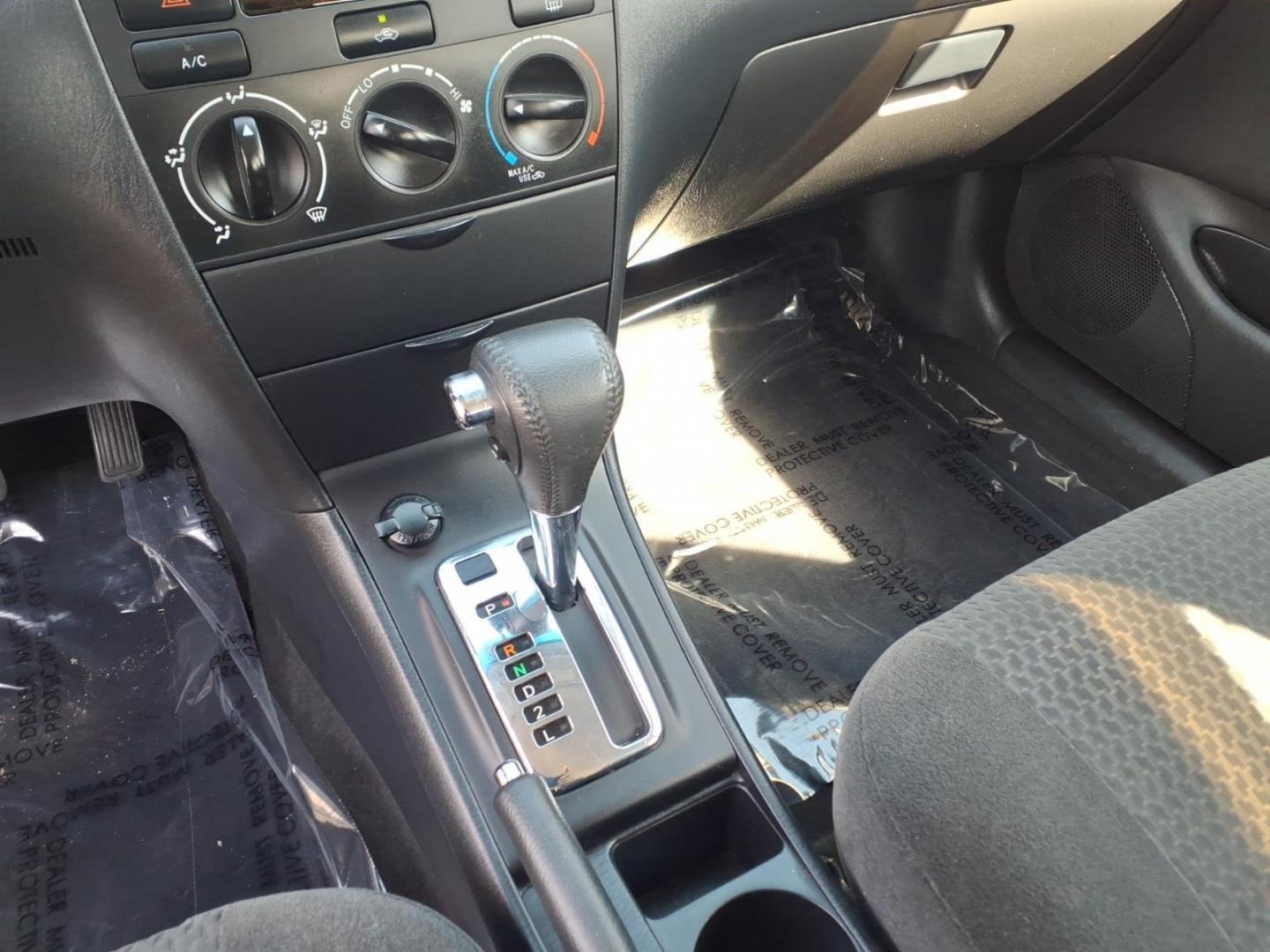 2006 Red Toyota Corolla CE (1NXBR32E16Z) with an 1.8L 1L NA I4 double overhead cam (DOHC) 16V Fuel Injected engine, 4-Speed Automatic transmission, located at 50 Eastern Blvd., Essex, MD, 21221, (410) 686-3444, 39.304367, -76.484947 - Photo#18