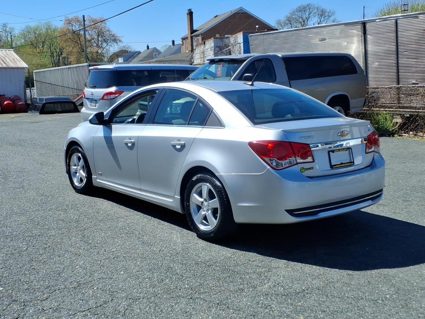 2013 Silver Chevrolet Cruze 1LT Auto (1G1PC5SBXD7) with an 1.4L Ecotec 1.4L Turbo I4 138hp 148ft. lbs. Sequential-Port F.I. engine, 6-Speed Shiftable Automatic transmission, located at 50 Eastern Blvd., Essex, MD, 21221, (410) 686-3444, 39.304367, -76.484947 - Photo#2