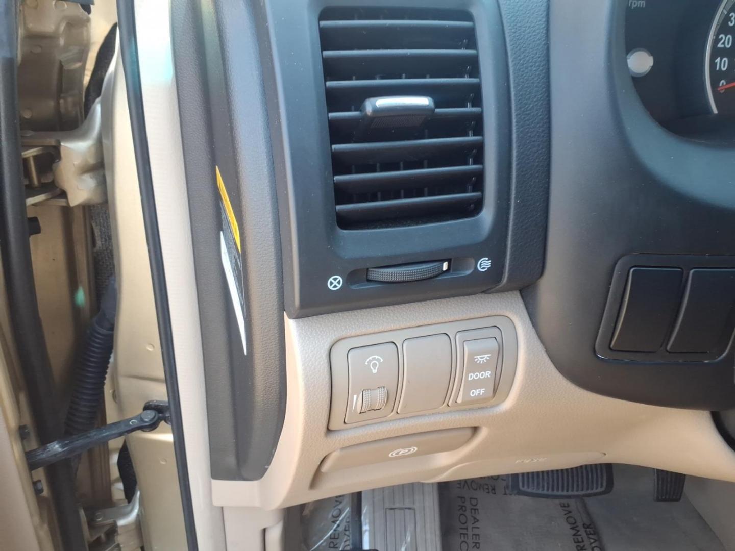 2007 Gold Hyundai Entourage GLS (KNDMC233876) with an 3.8L 3.8L V6 double overhead camshaft 24V Sequential-Port F.I. engine, 5-Speed Shiftable Automatic transmission, located at 50 Eastern Blvd., Essex, MD, 21221, (410) 686-3444, 39.304367, -76.484947 - Photo#20