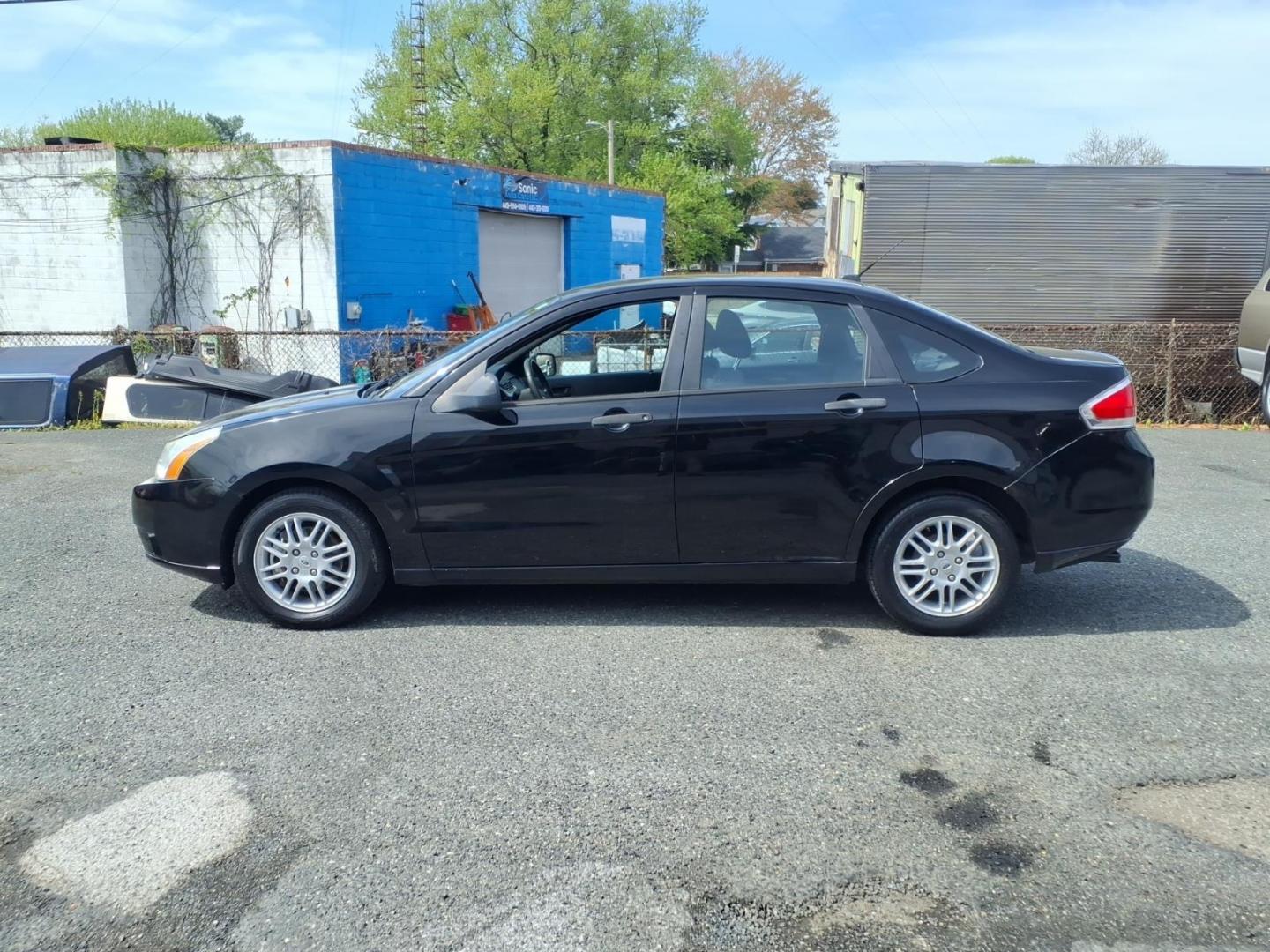 2011 Black Ford Focus SE (1FAHP3FN6BW) with an 2.0L 4 Cylinder Sequential-Port F.I. engine, Automatic transmission, located at 50 Eastern Blvd., Essex, MD, 21221, (410) 686-3444, 39.304367, -76.484947 - Photo#1