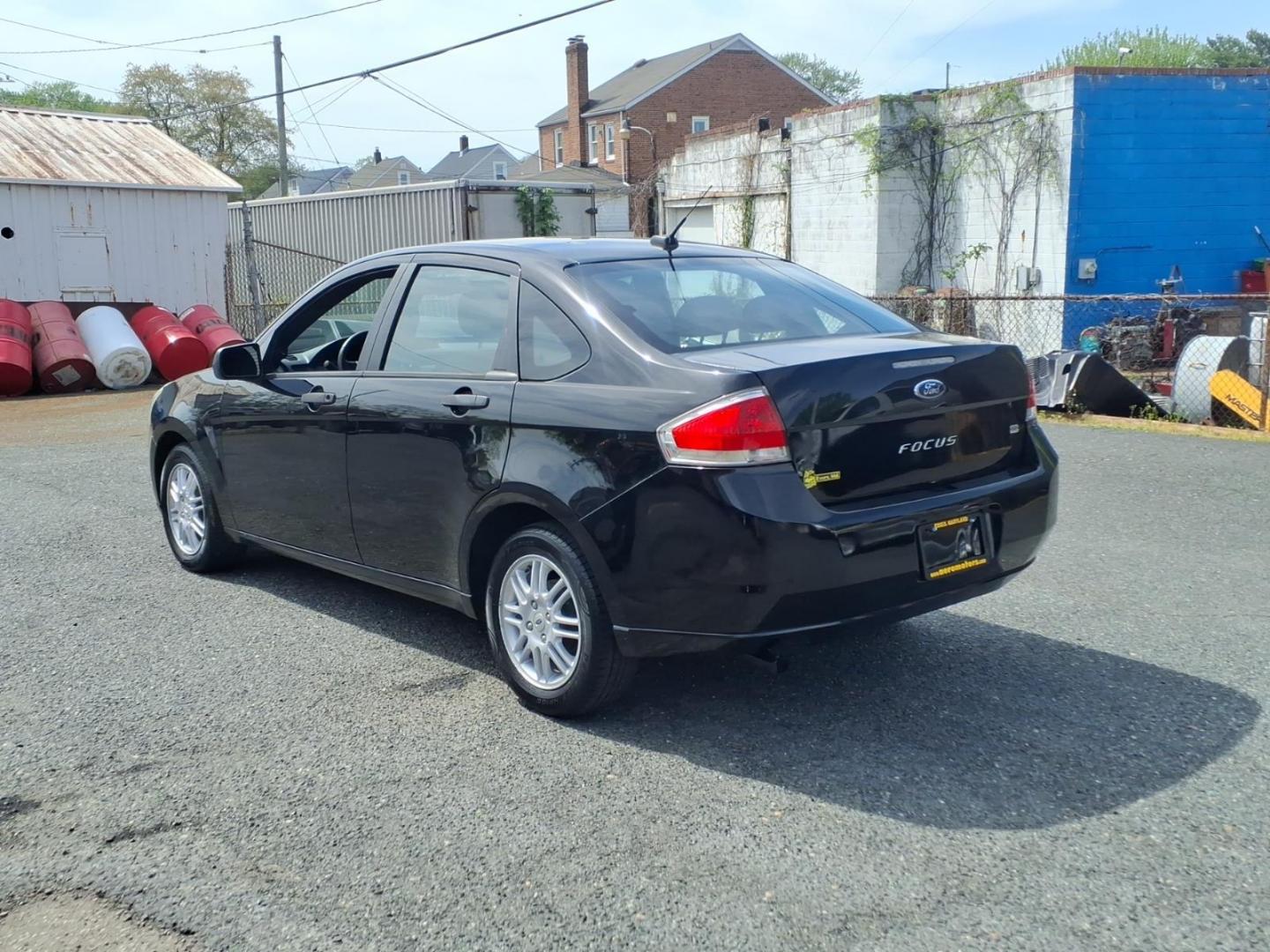 2011 Black Ford Focus SE (1FAHP3FN6BW) with an 2.0L 4 Cylinder Sequential-Port F.I. engine, Automatic transmission, located at 50 Eastern Blvd., Essex, MD, 21221, (410) 686-3444, 39.304367, -76.484947 - Photo#2
