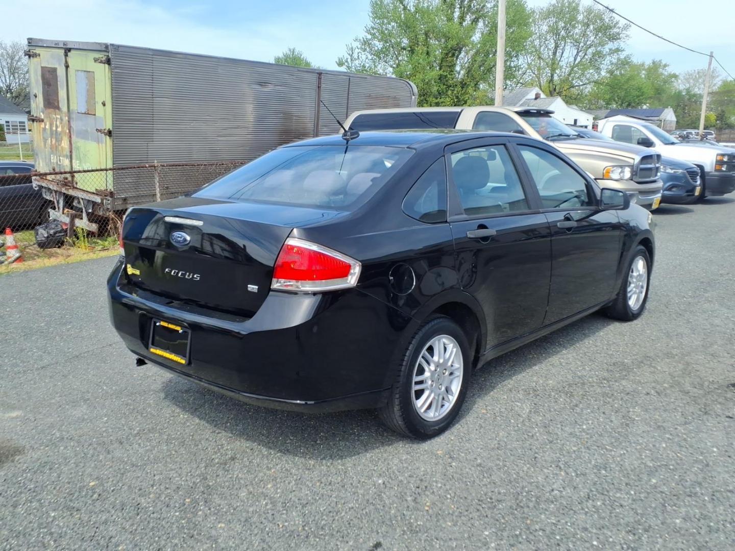 2011 Black Ford Focus SE (1FAHP3FN6BW) with an 2.0L 4 Cylinder Sequential-Port F.I. engine, Automatic transmission, located at 50 Eastern Blvd., Essex, MD, 21221, (410) 686-3444, 39.304367, -76.484947 - Photo#4