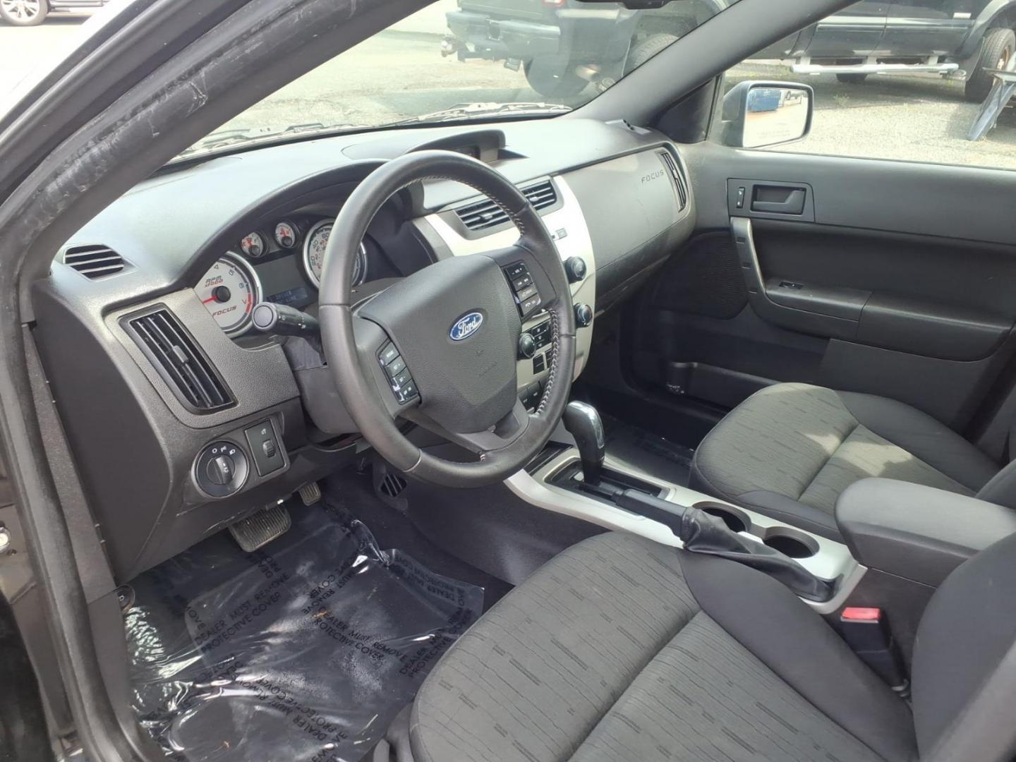 2011 Black Ford Focus SE (1FAHP3FN6BW) with an 2.0L 4 Cylinder Sequential-Port F.I. engine, Automatic transmission, located at 50 Eastern Blvd., Essex, MD, 21221, (410) 686-3444, 39.304367, -76.484947 - Photo#8