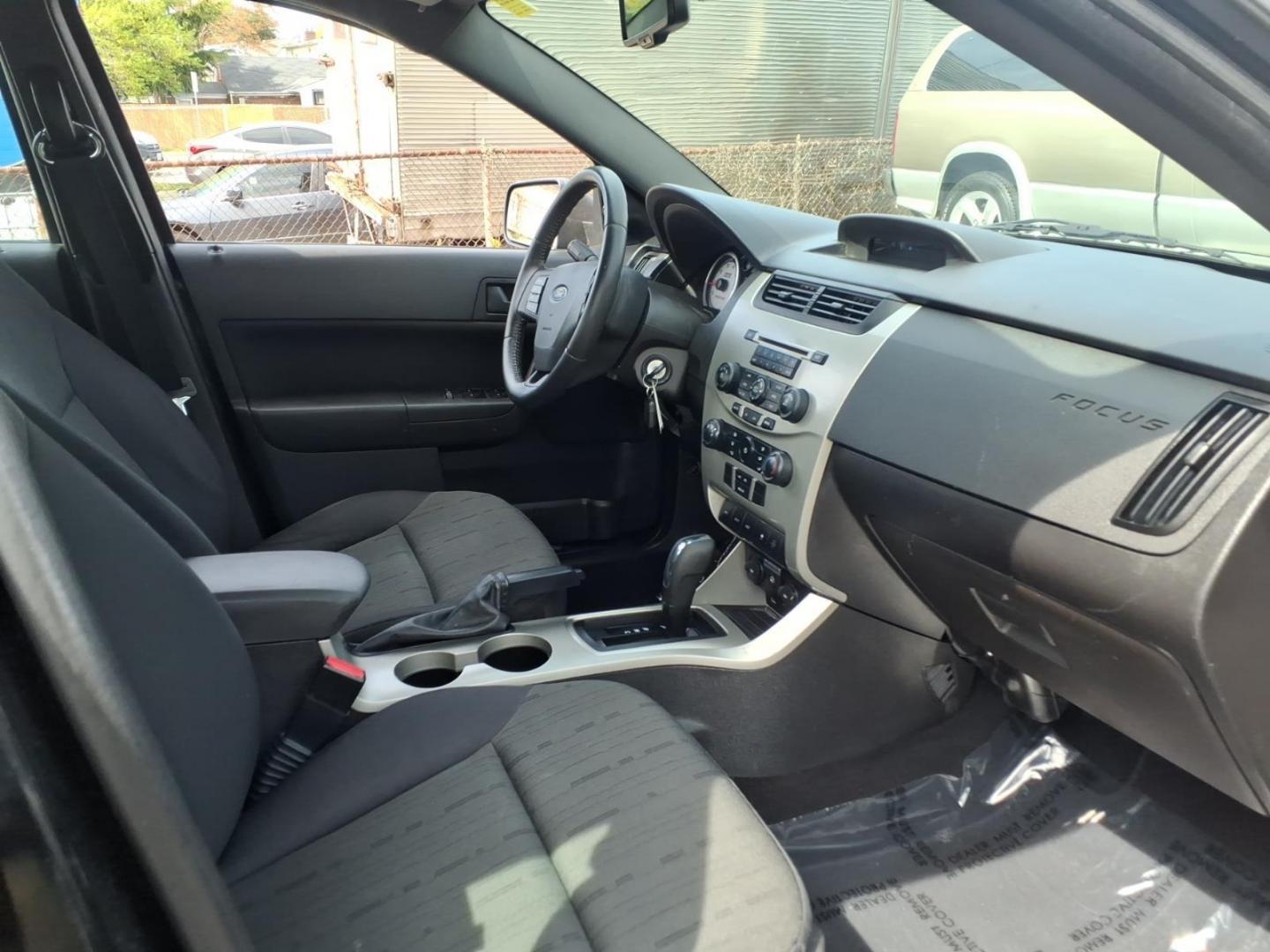 2011 Black Ford Focus SE (1FAHP3FN6BW) with an 2.0L 4 Cylinder Sequential-Port F.I. engine, Automatic transmission, located at 50 Eastern Blvd., Essex, MD, 21221, (410) 686-3444, 39.304367, -76.484947 - Photo#13