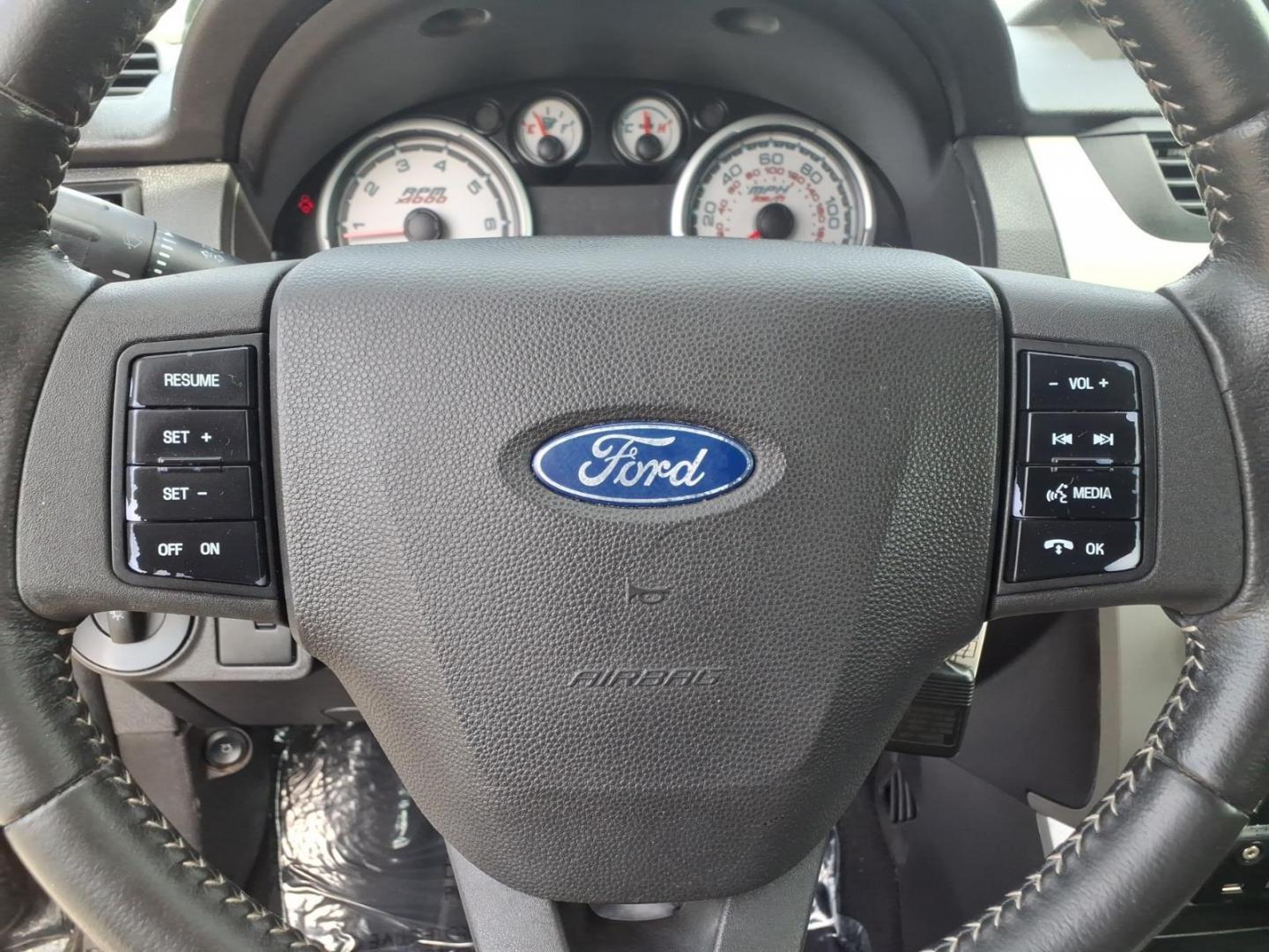 2011 Black Ford Focus SE (1FAHP3FN6BW) with an 2.0L 4 Cylinder Sequential-Port F.I. engine, Automatic transmission, located at 50 Eastern Blvd., Essex, MD, 21221, (410) 686-3444, 39.304367, -76.484947 - Photo#19