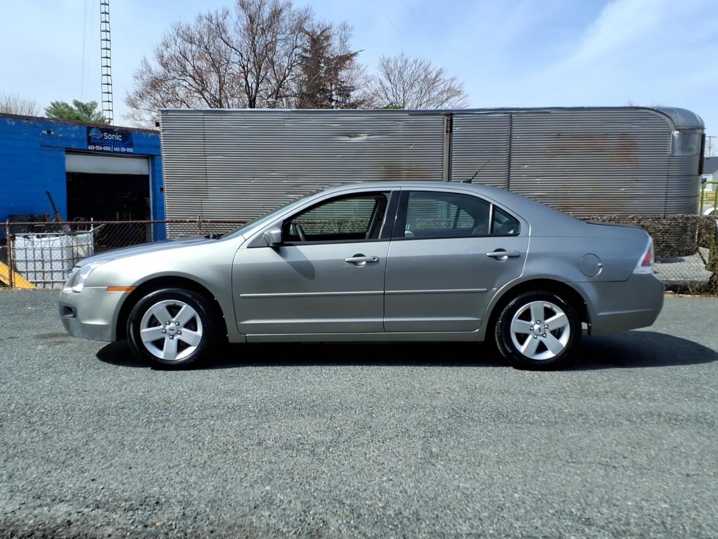 2009 Brown Ford Fusion (3FAHP07Z09R) with an 2.3L 4 Cylinder Sequential-Port F.I. engine, Automatic transmission, located at 50 Eastern Blvd., Essex, MD, 21221, (410) 686-3444, 39.304367, -76.484947 - Photo#1