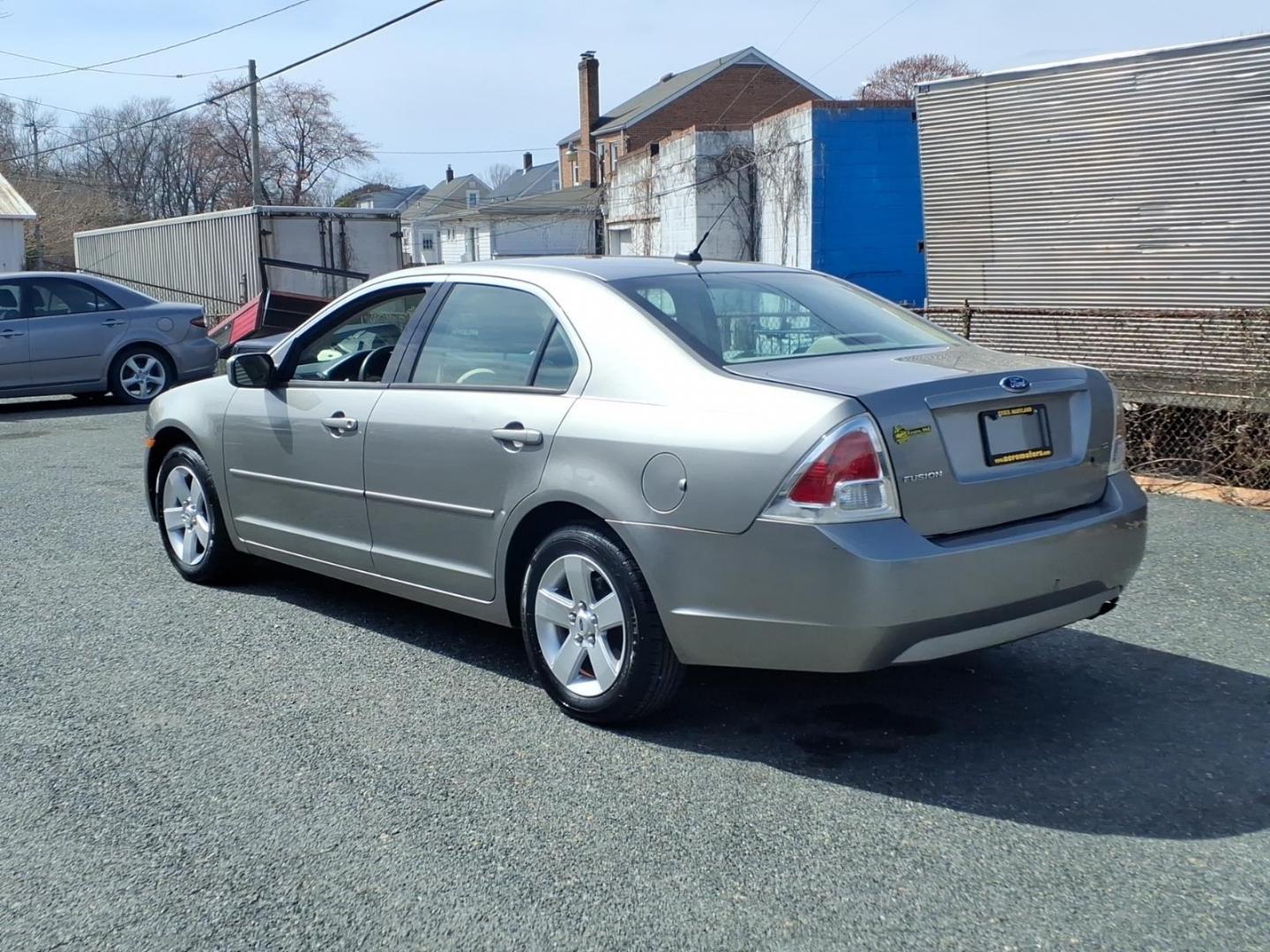 2009 Brown Ford Fusion (3FAHP07Z09R) with an 2.3L 4 Cylinder Sequential-Port F.I. engine, Automatic transmission, located at 50 Eastern Blvd., Essex, MD, 21221, (410) 686-3444, 39.304367, -76.484947 - Photo#2